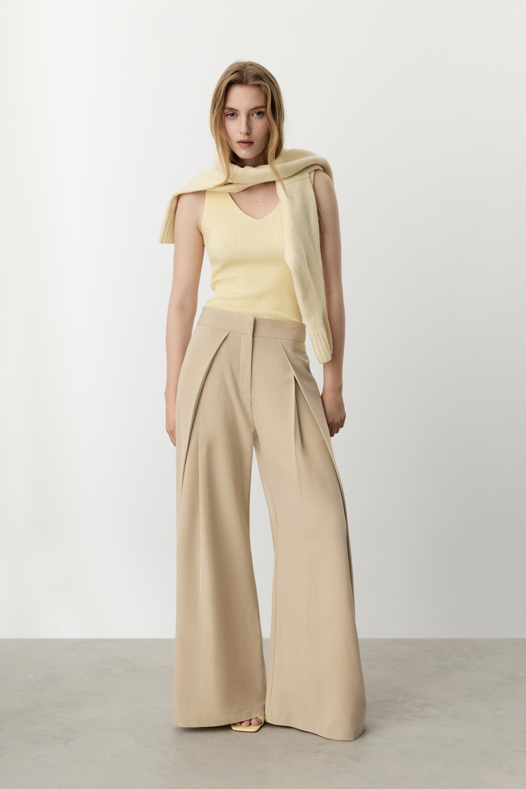 Pantalón wide leg pliegues