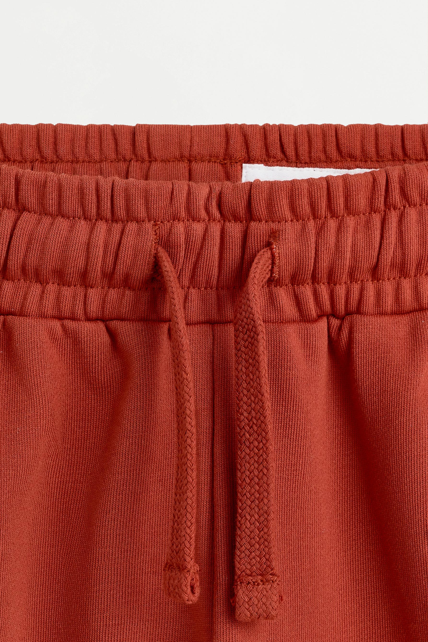 Plush Bermuda shorts with text — DARK PINK