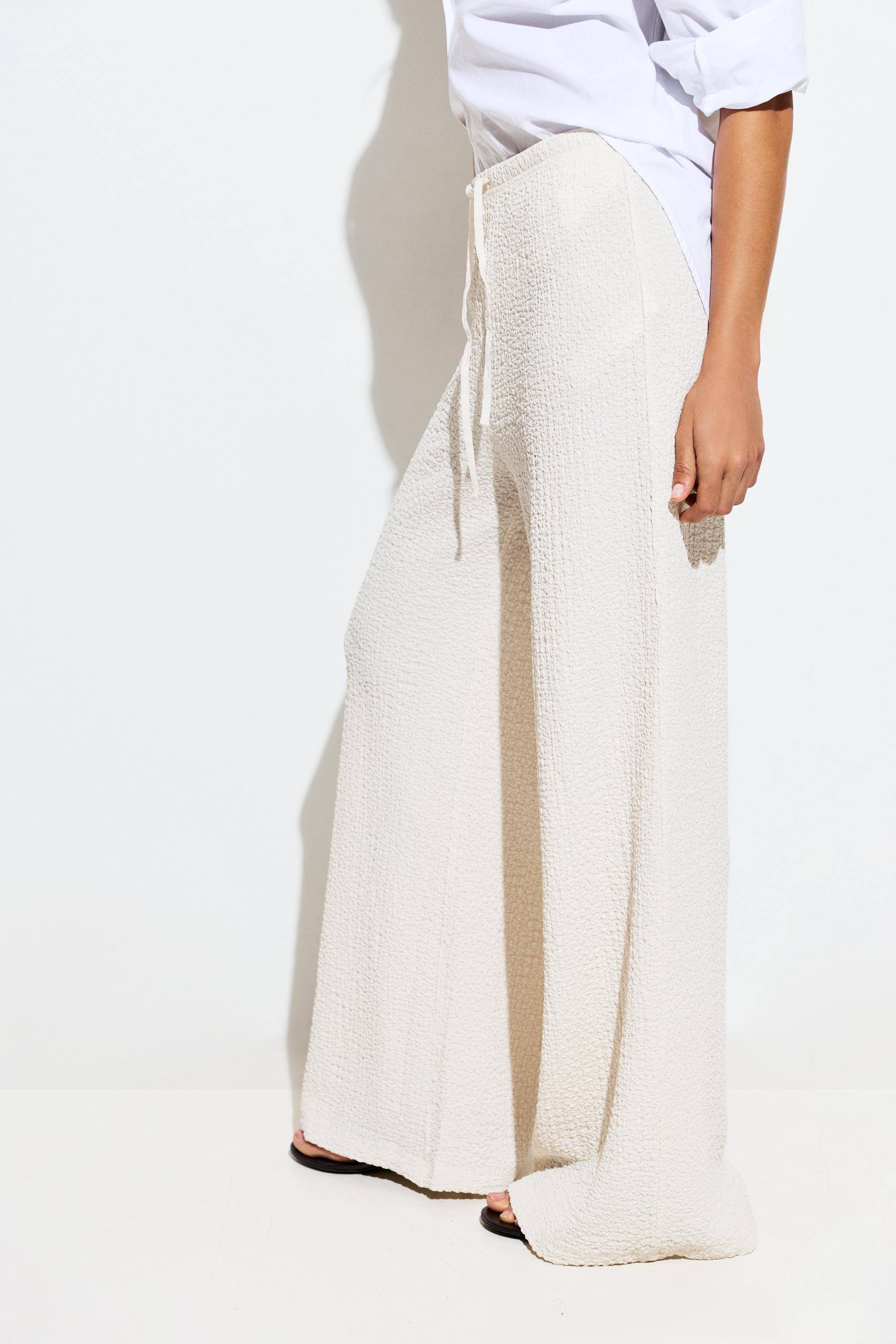 Textured wide-leg trousers — OFF WHITE