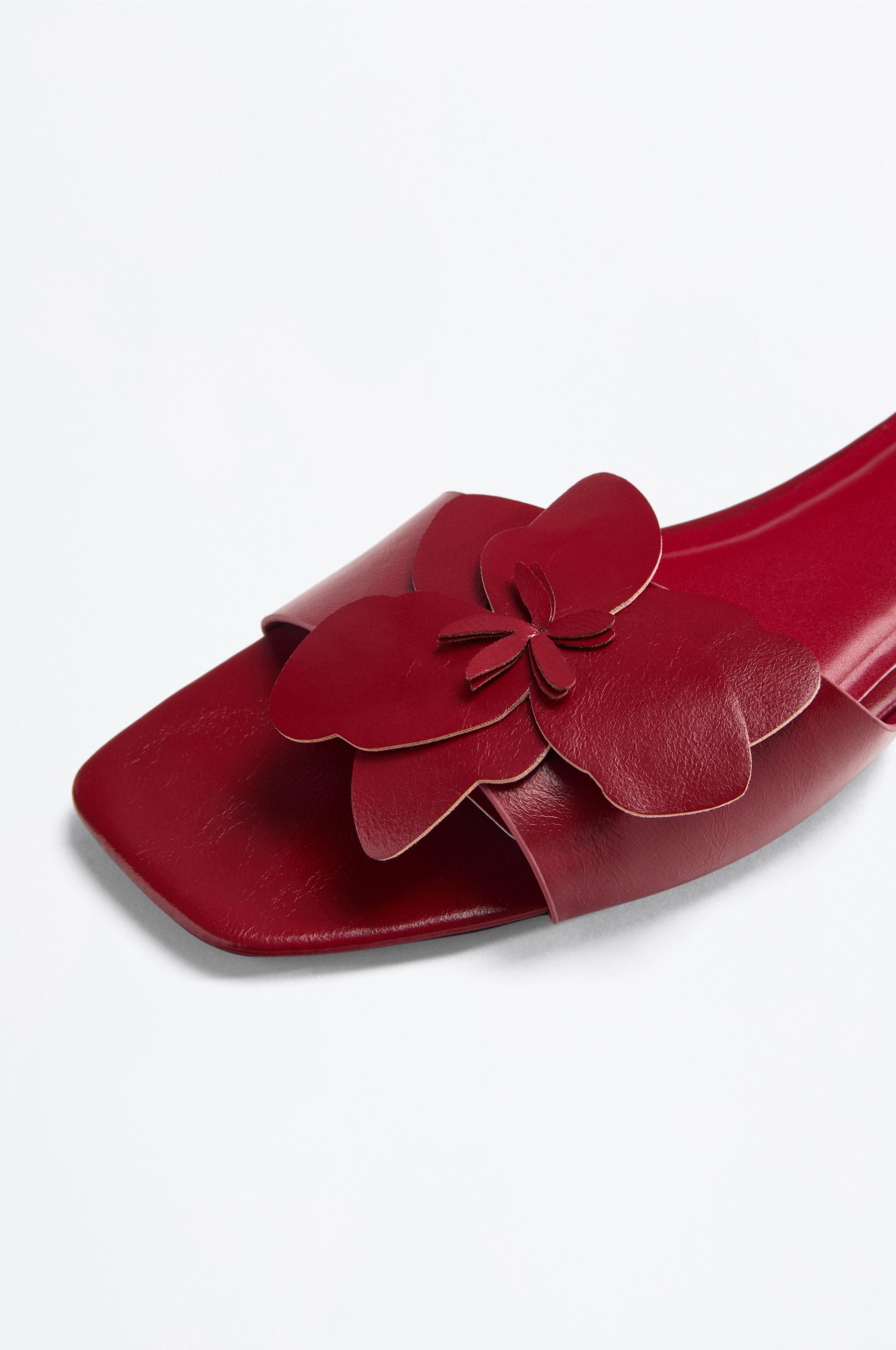 Flat slider sandals with flower detail — RED