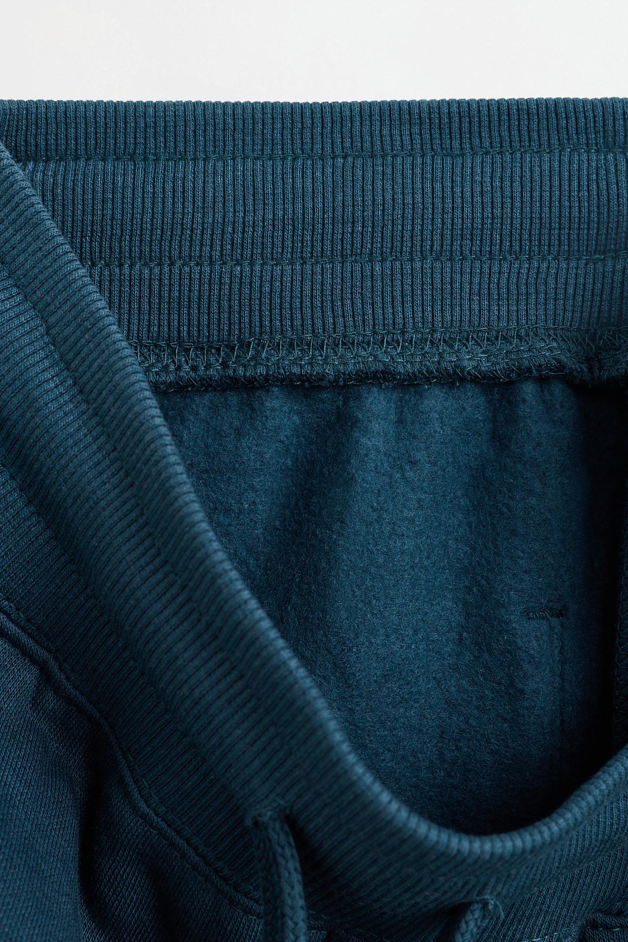 Plush trousers with knee stitching — PETROL BLUE