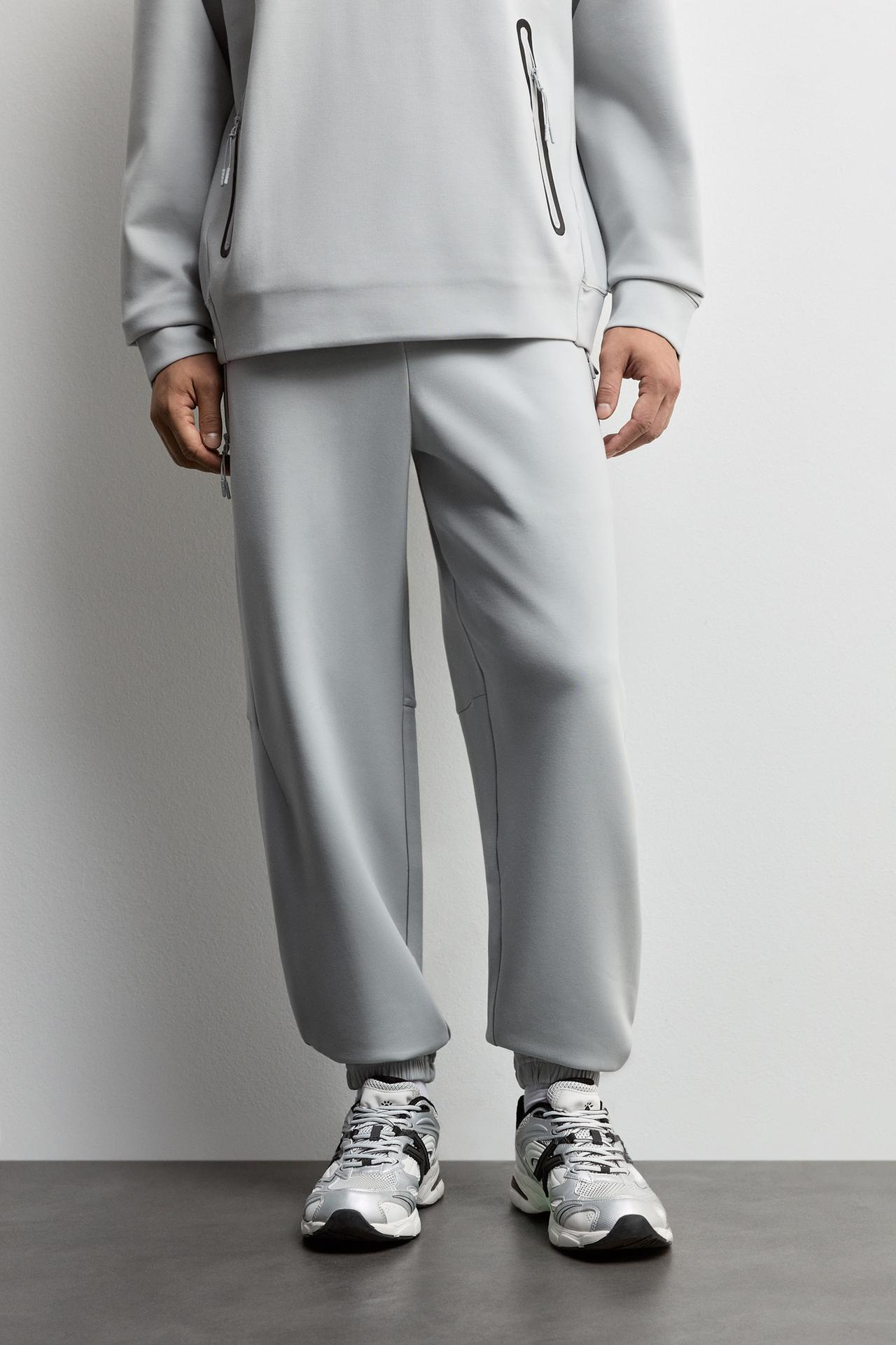 Wide-leg interlock trousers — GREY MARL