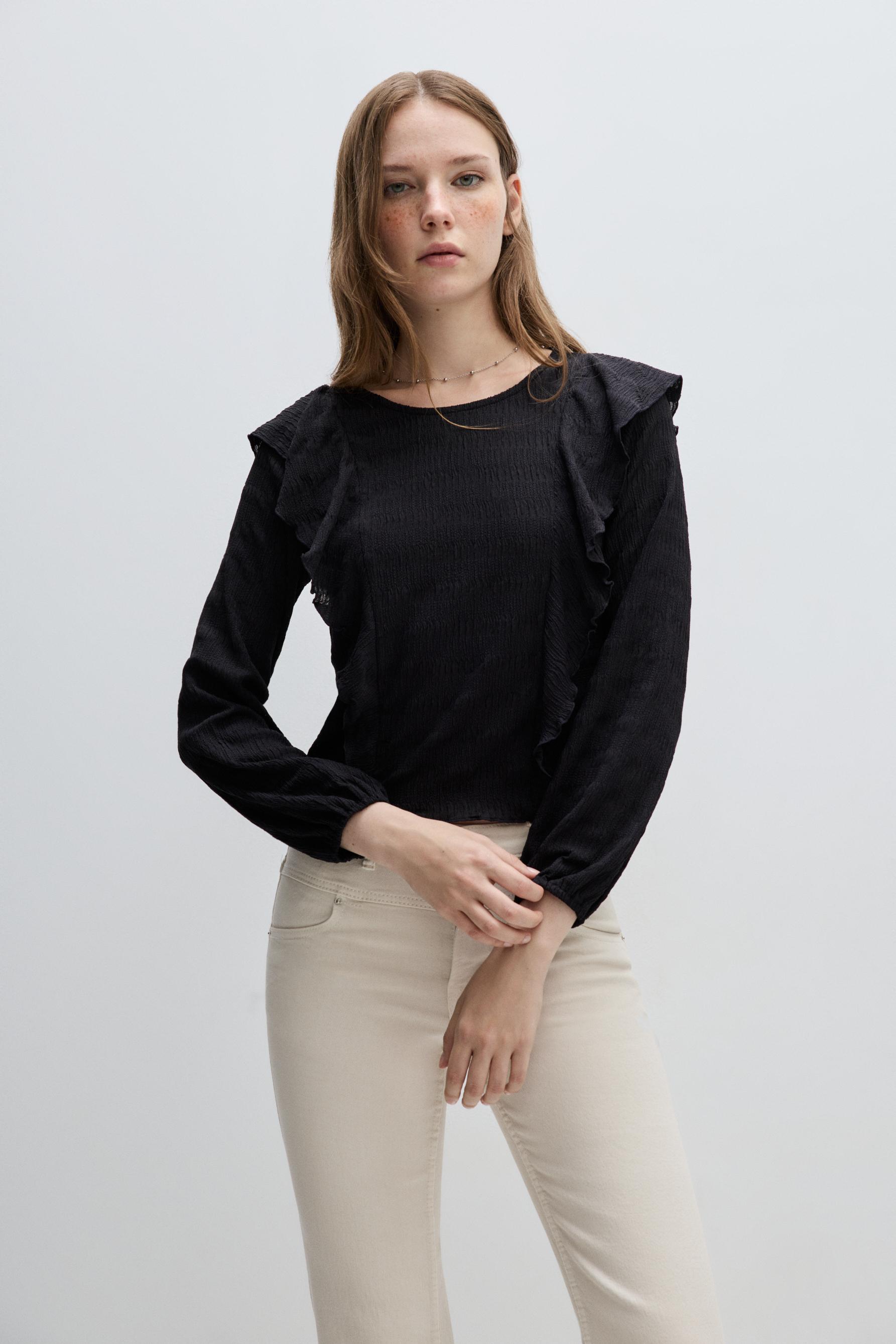 Blusa textura volantes