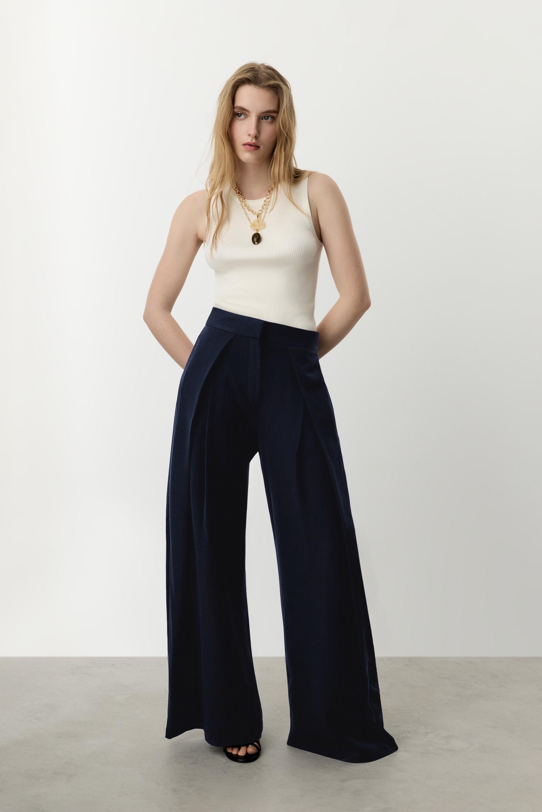 Pantalón wide leg pliegues