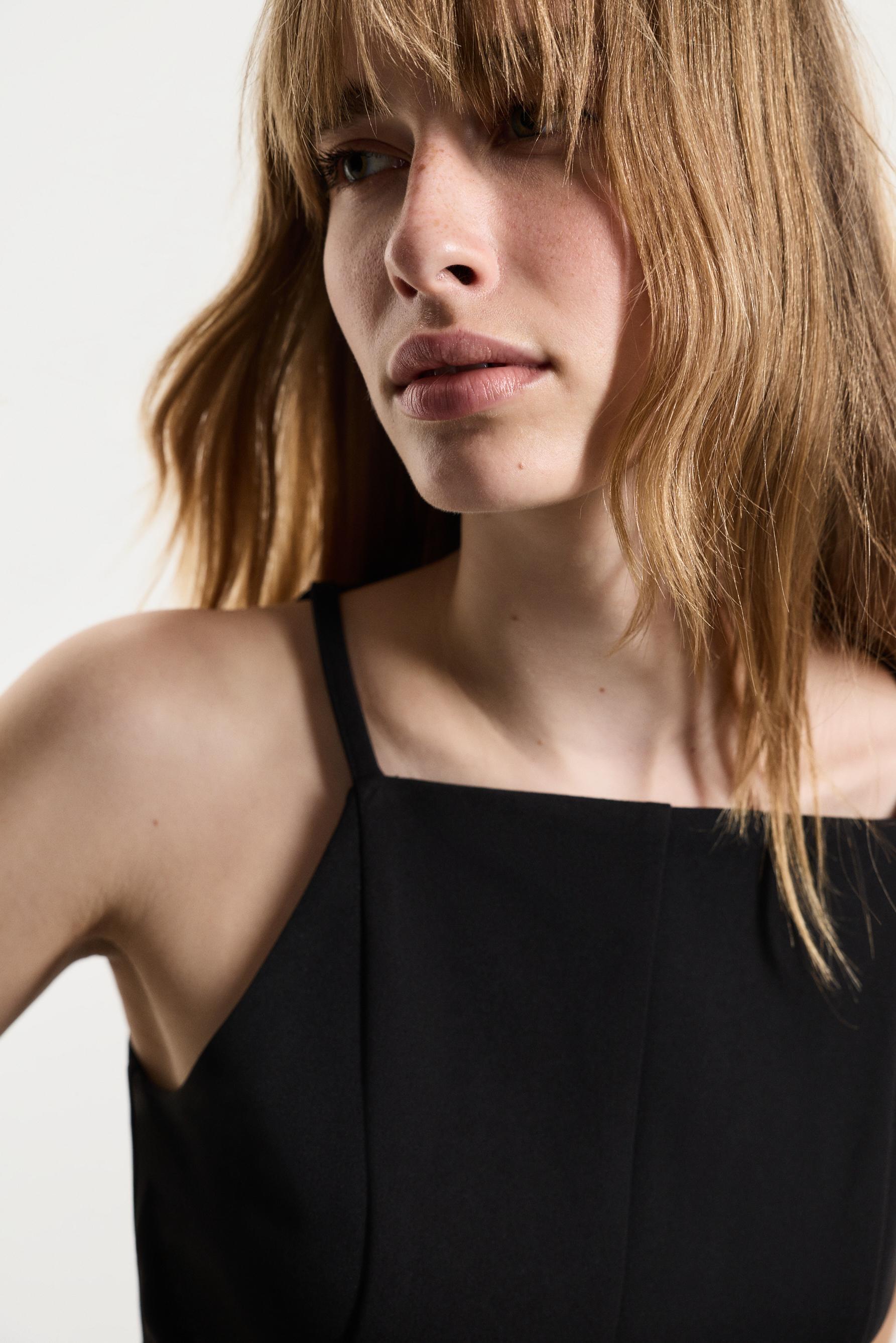 Peplum halter top — BLACK