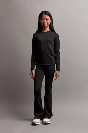 HEAVYWEIGHT Thermal Bell Bottom Leggings — BLACK 1