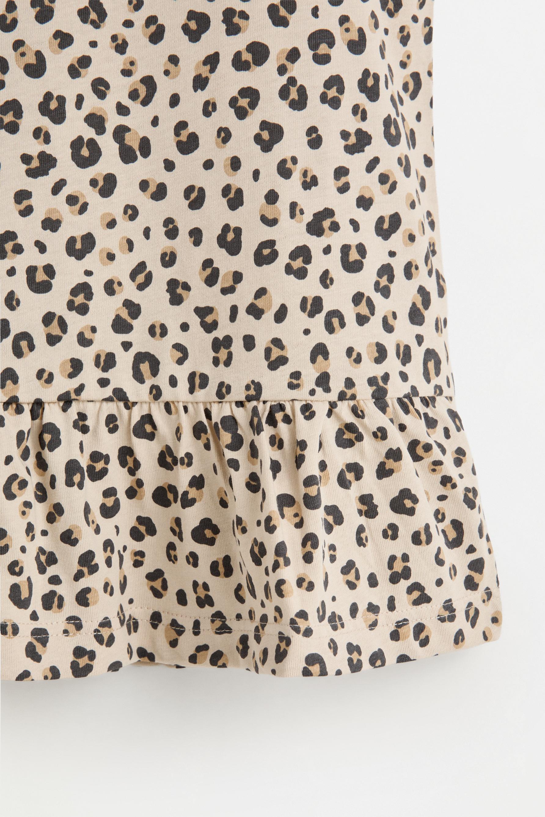 Printed peplum sleeveless t-shirt — HIELO