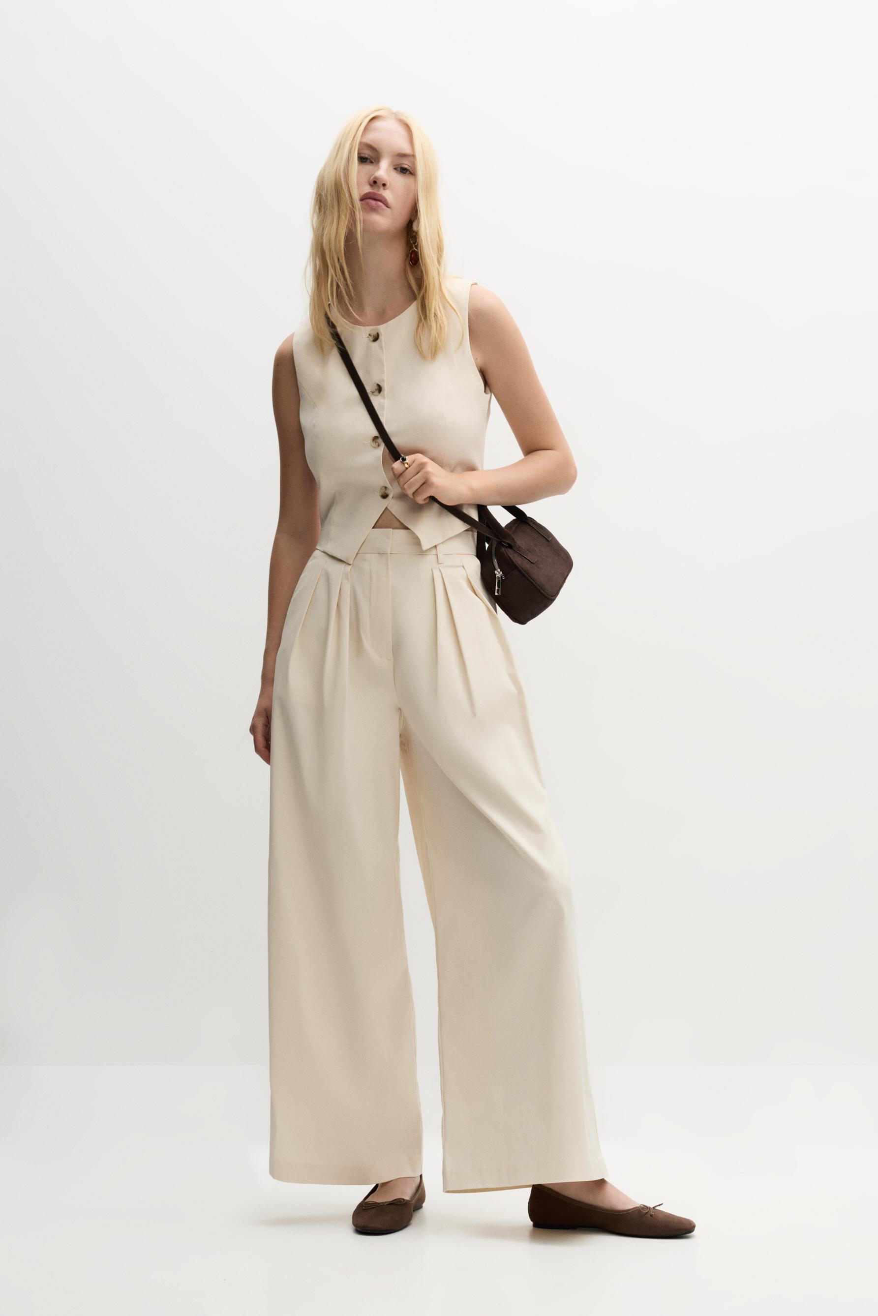 Pantalón wide pliegues