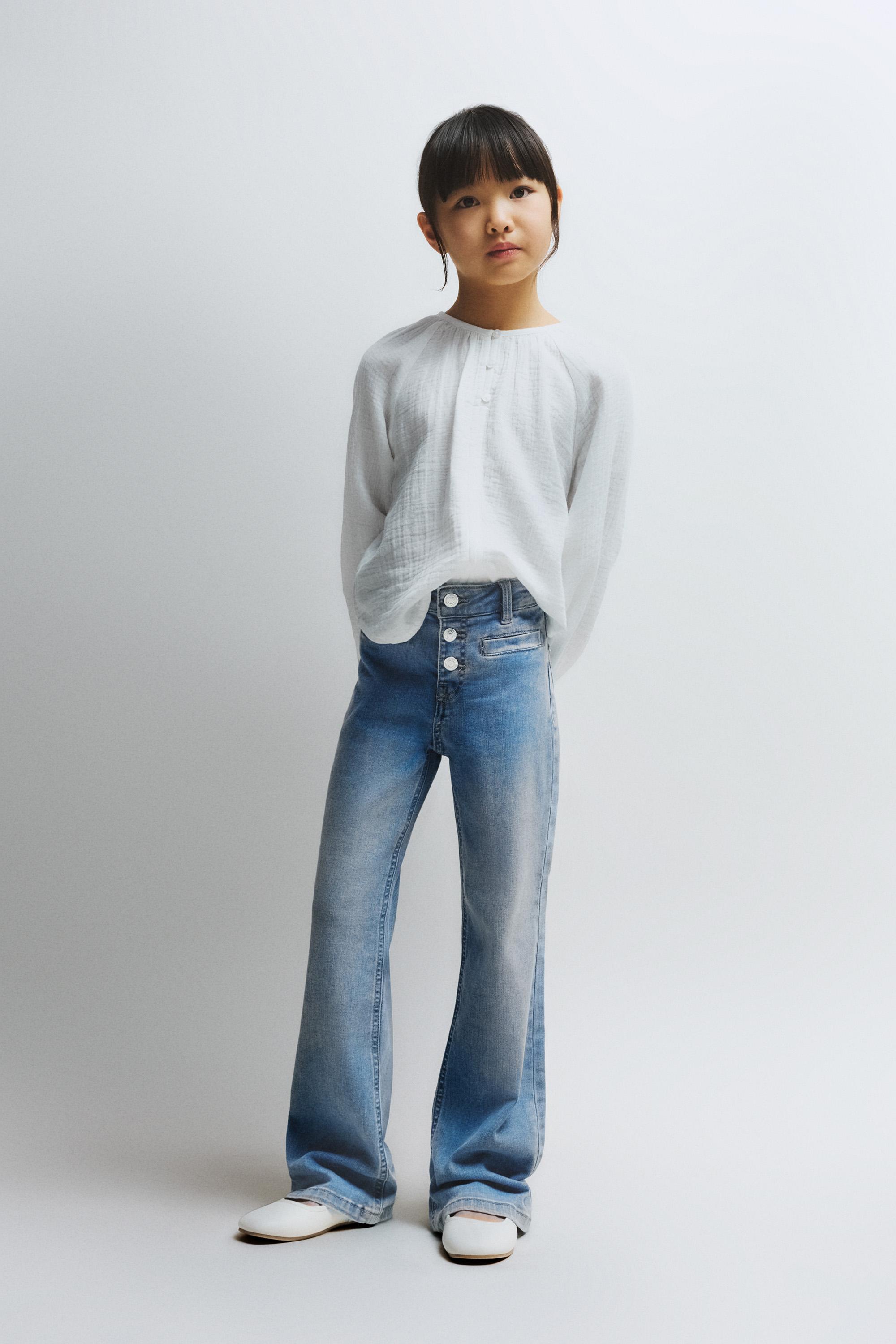 Bell bottom jeans with buttons — PALE BLUE