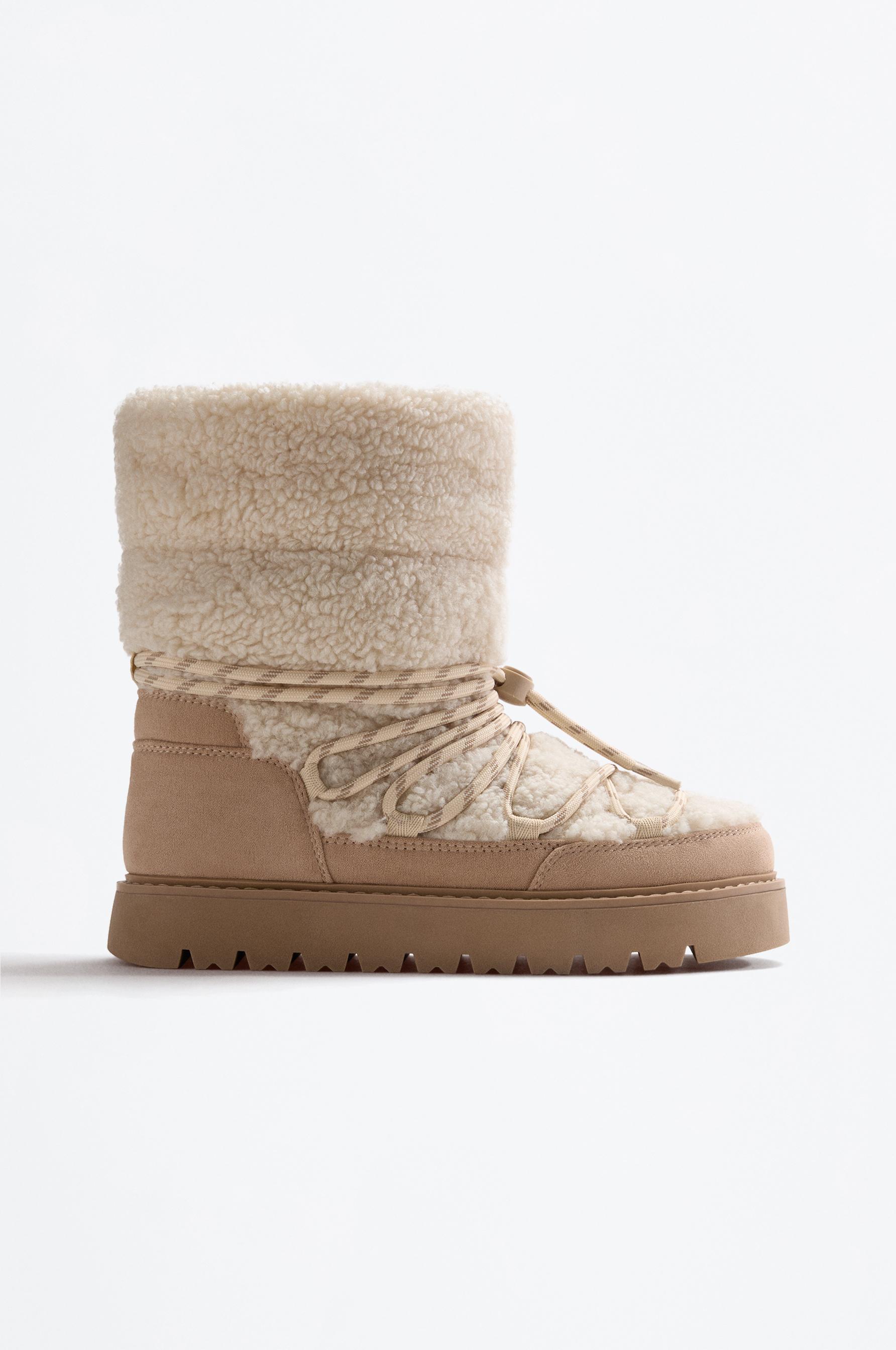 Bota nieve acordonada