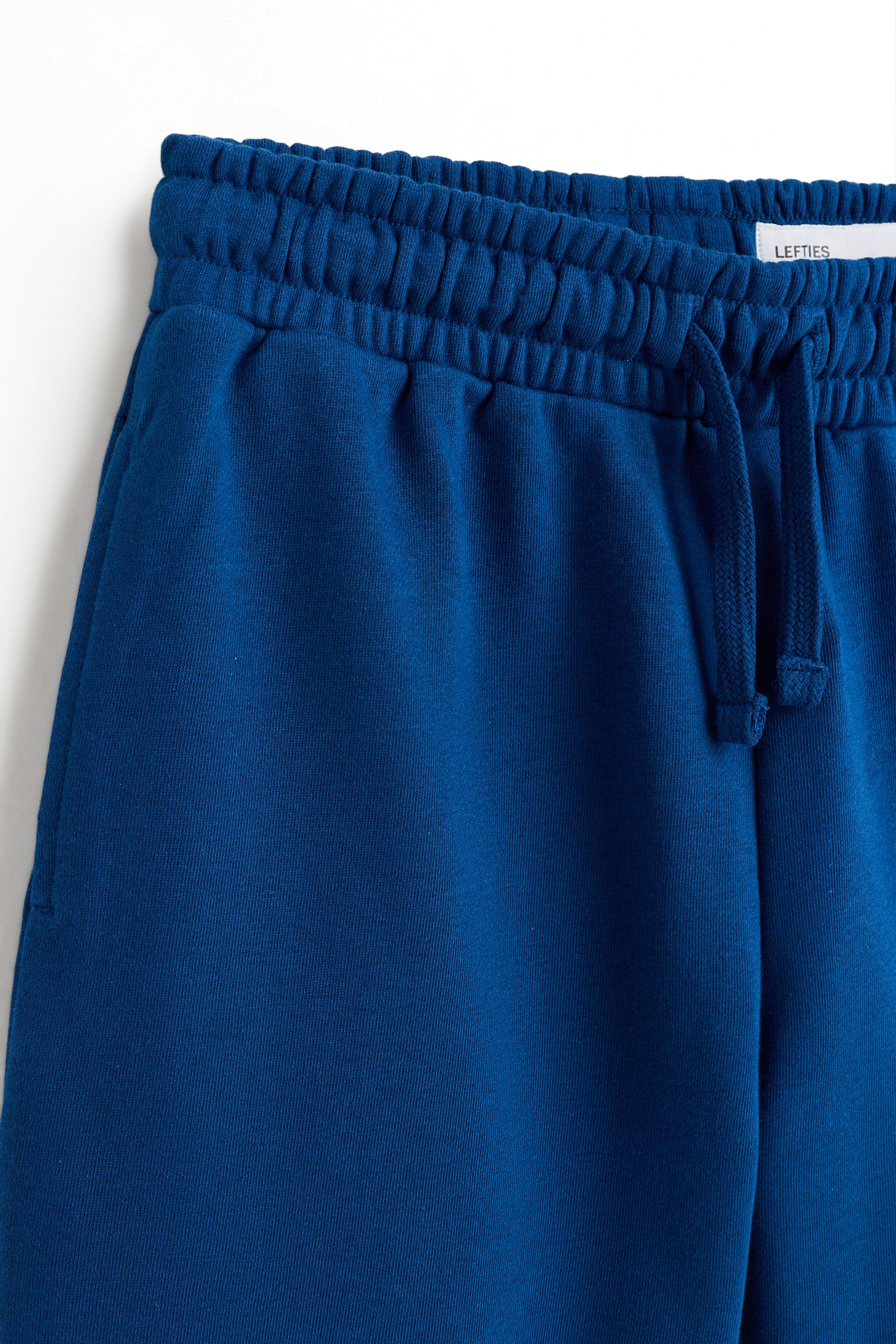 Plush Bermuda shorts with text — DARK BLUE