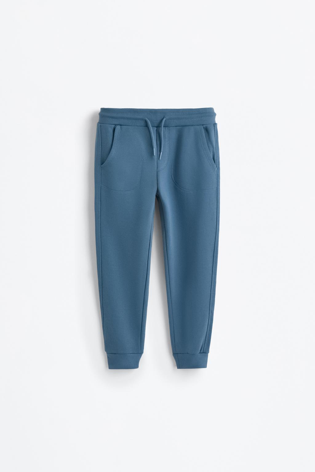 Plush trousers with seams