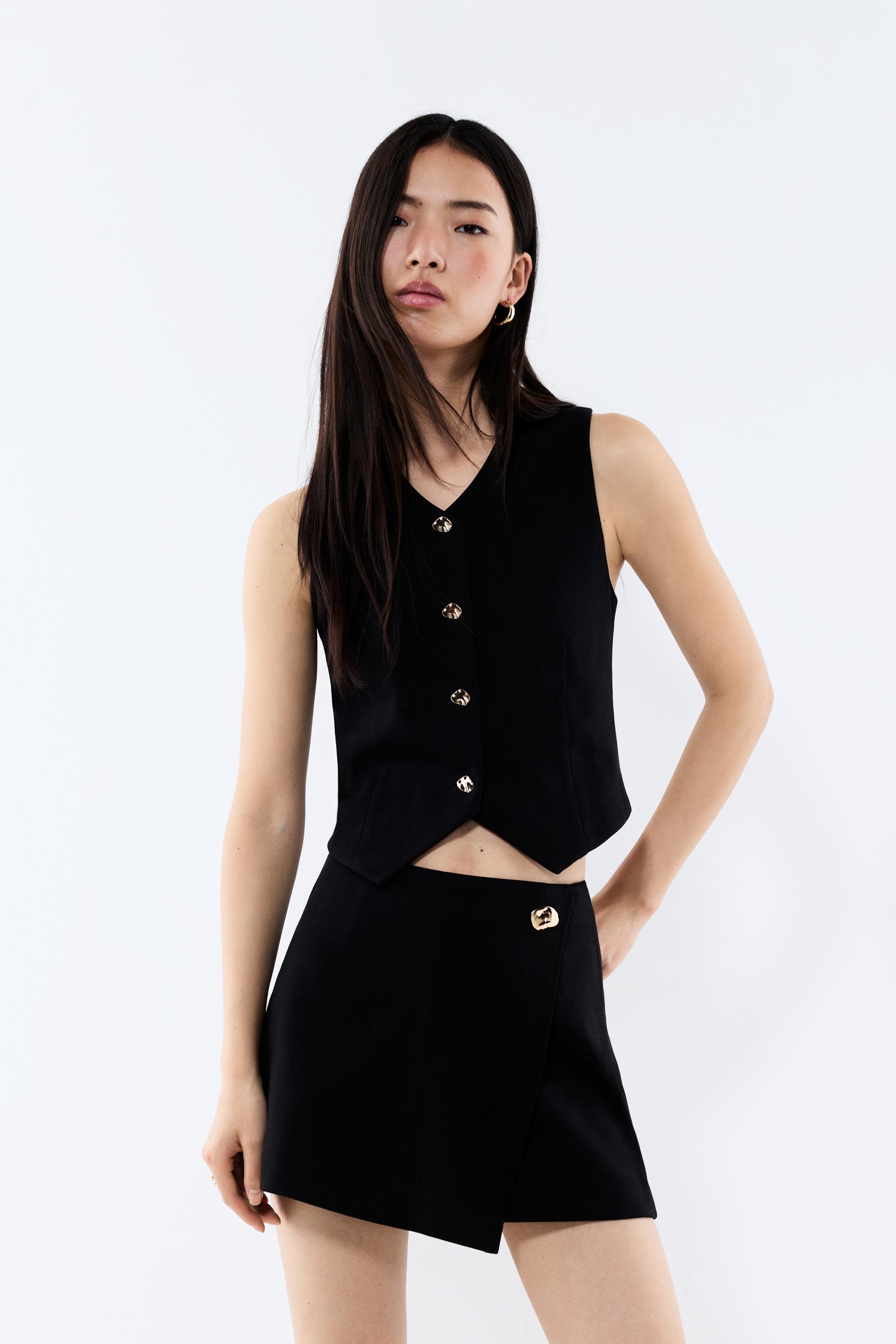 Top interlock botones dorados