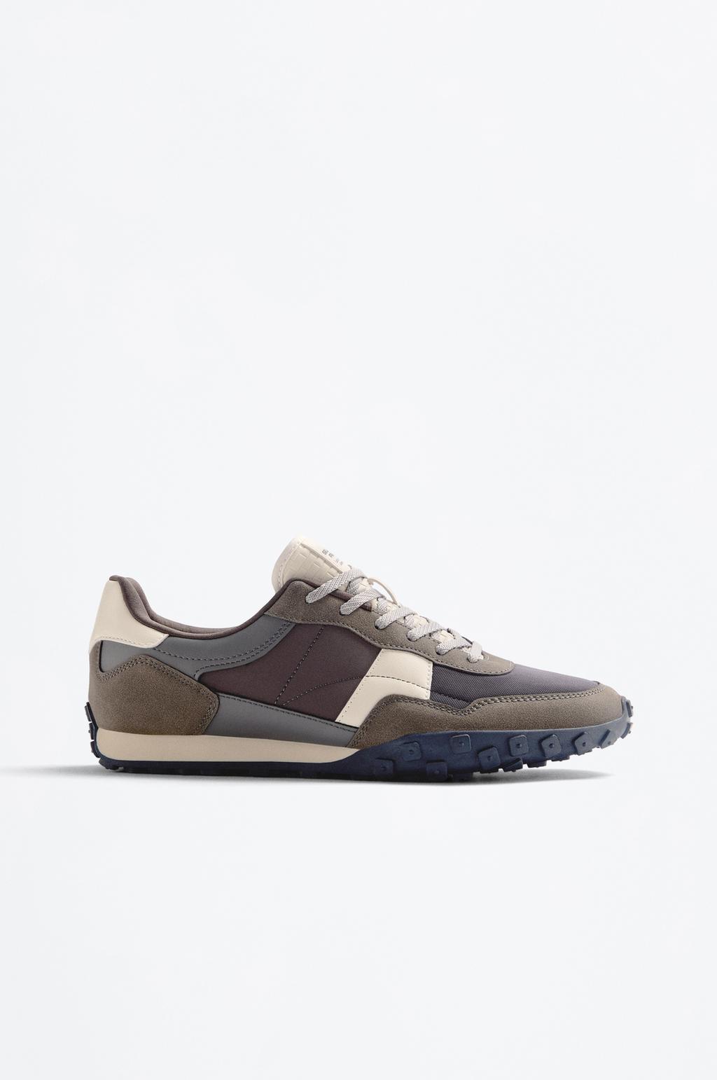 Trainers with track soles