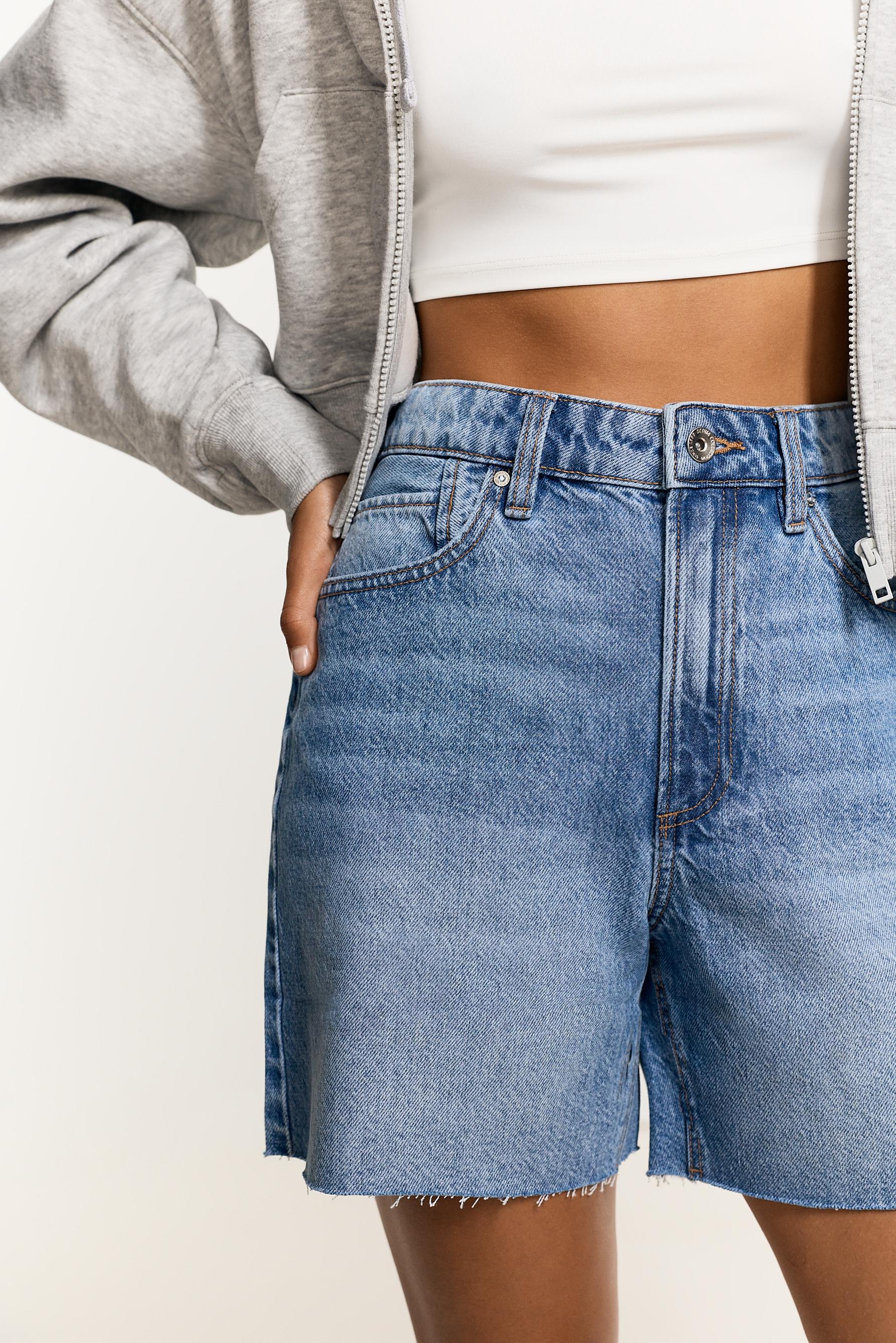 Distressed denim Bermuda shorts — PALE INDIGO
