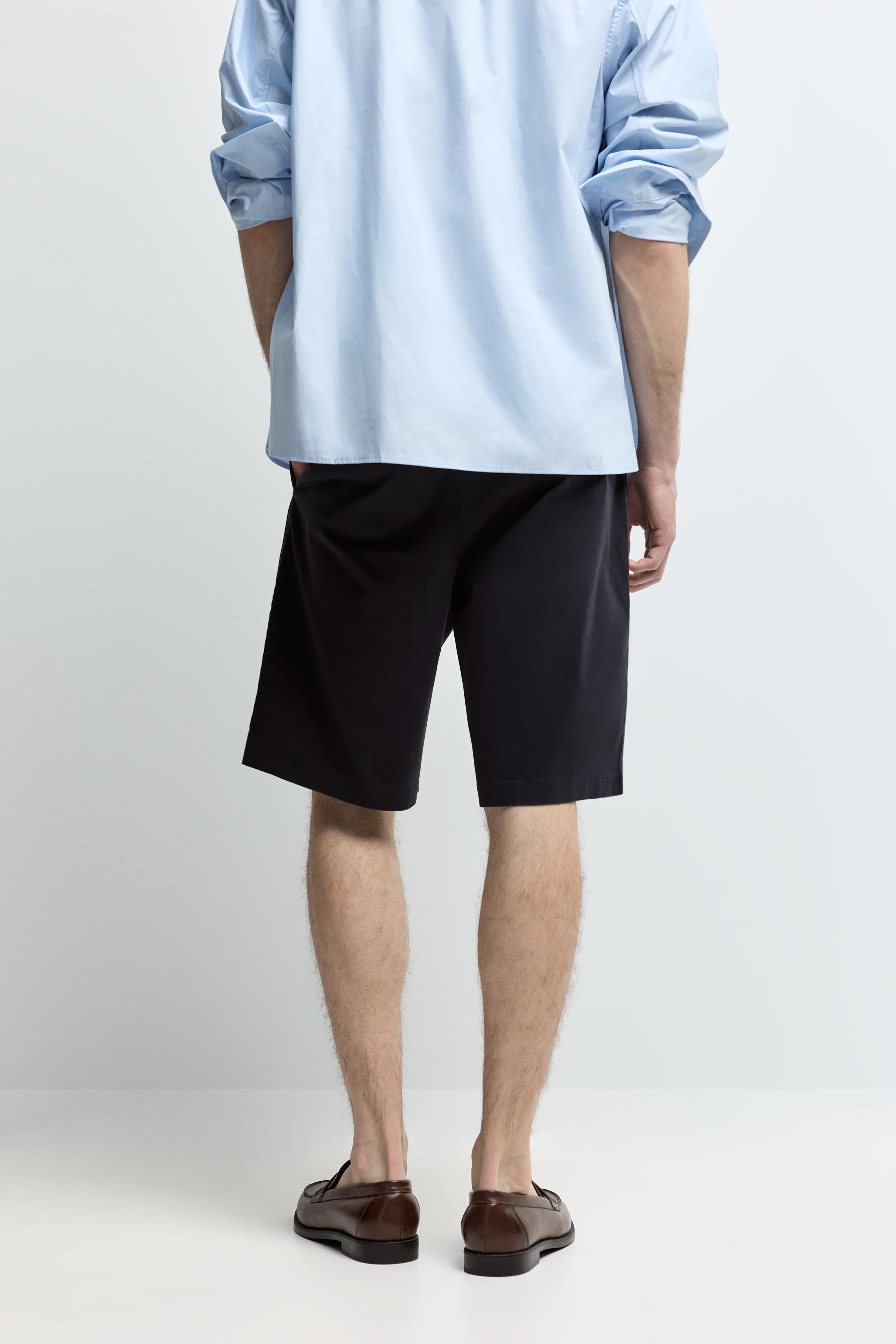 Pleated chino Bermuda shorts — NAVY BLUE