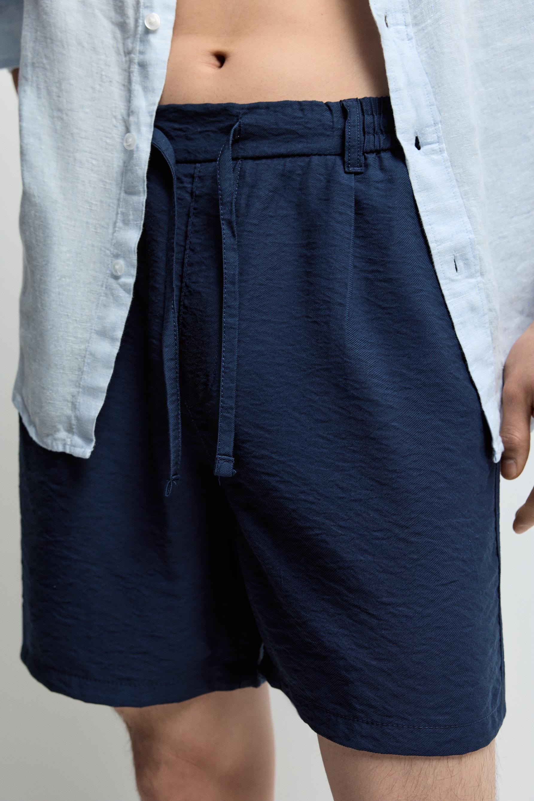 Flowing pleated Bermuda shorts — NAVY