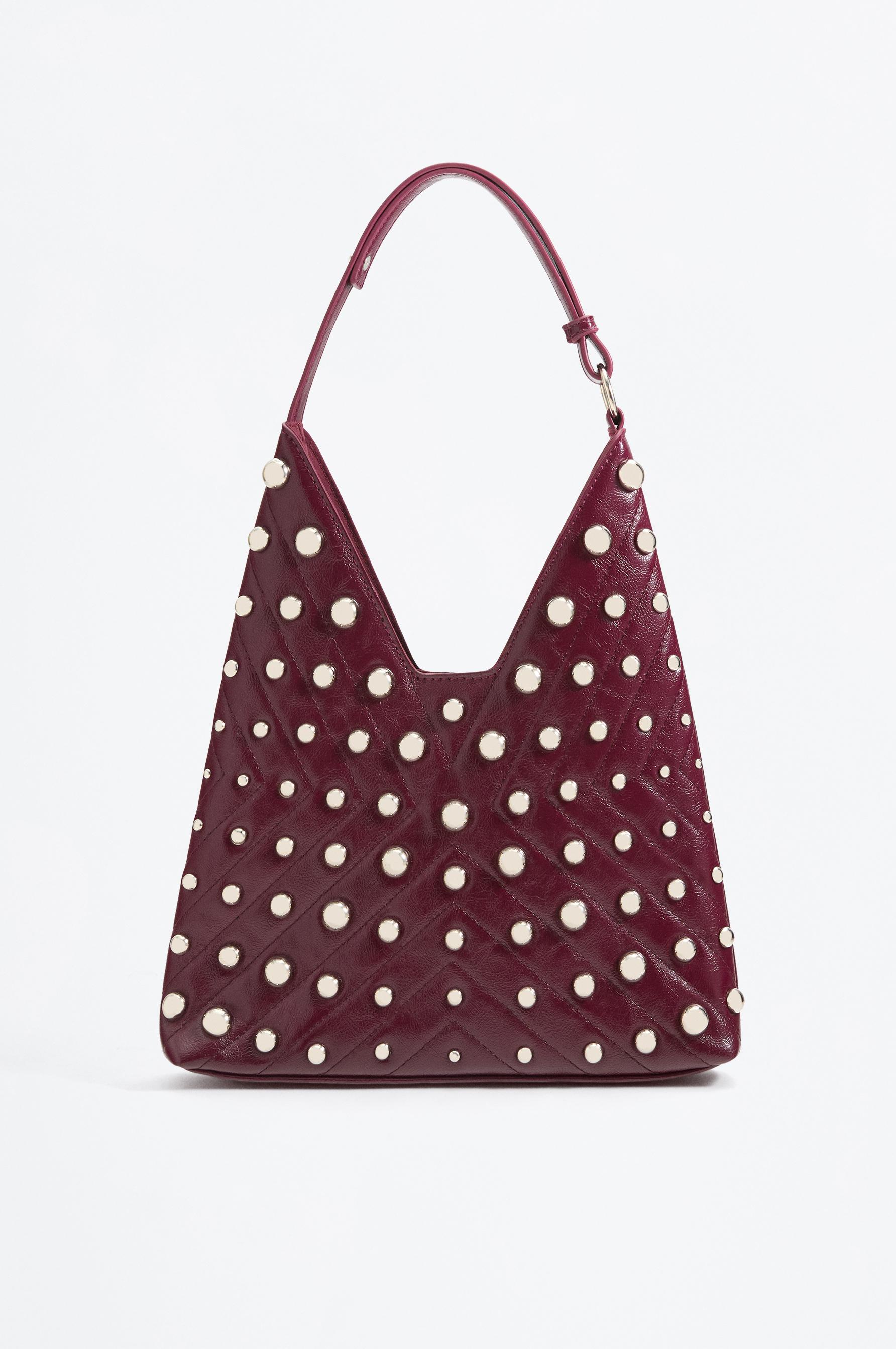Bolso de hombro grande tachas