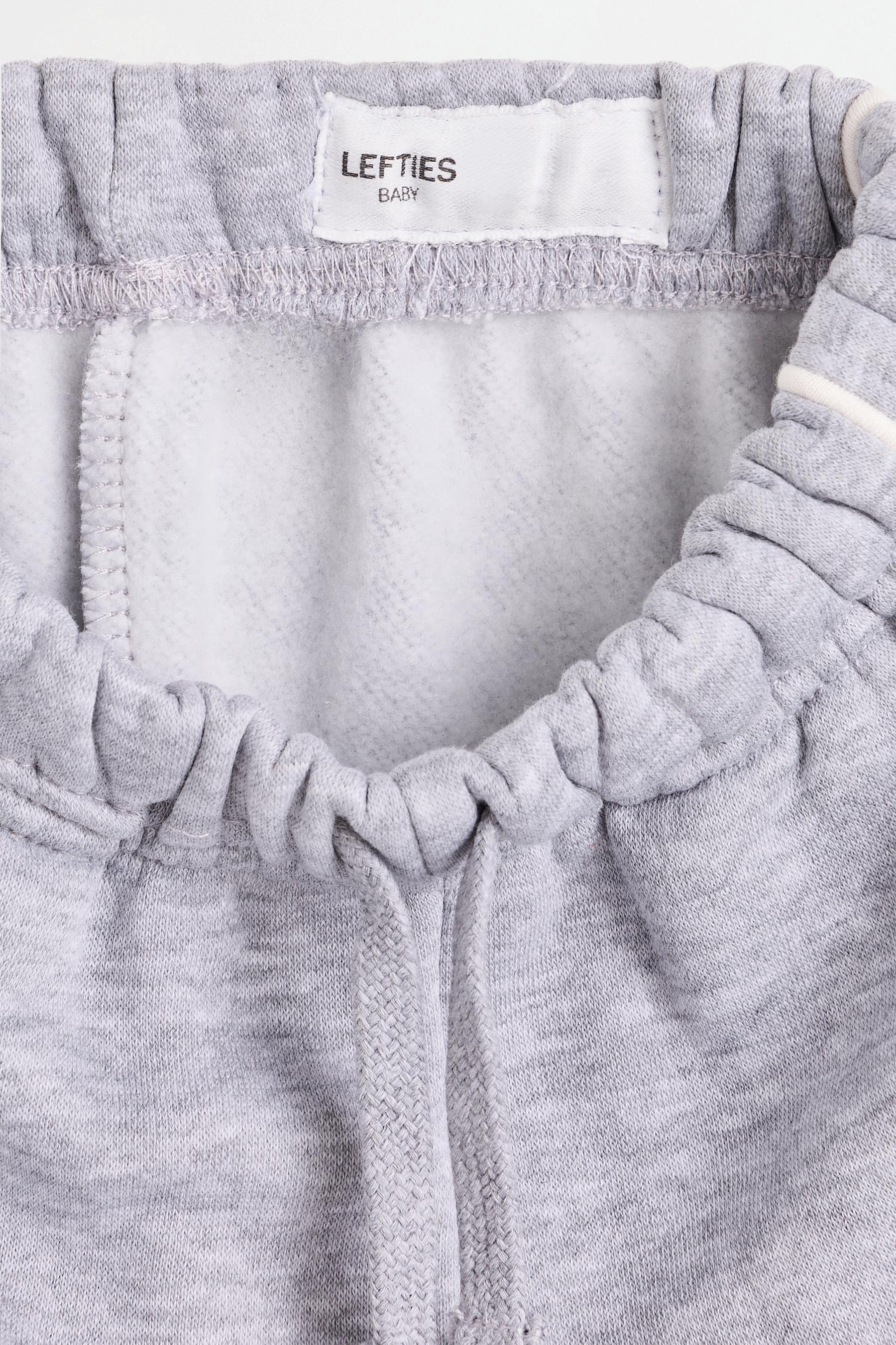 Plush trousers with piping — GREY MARL