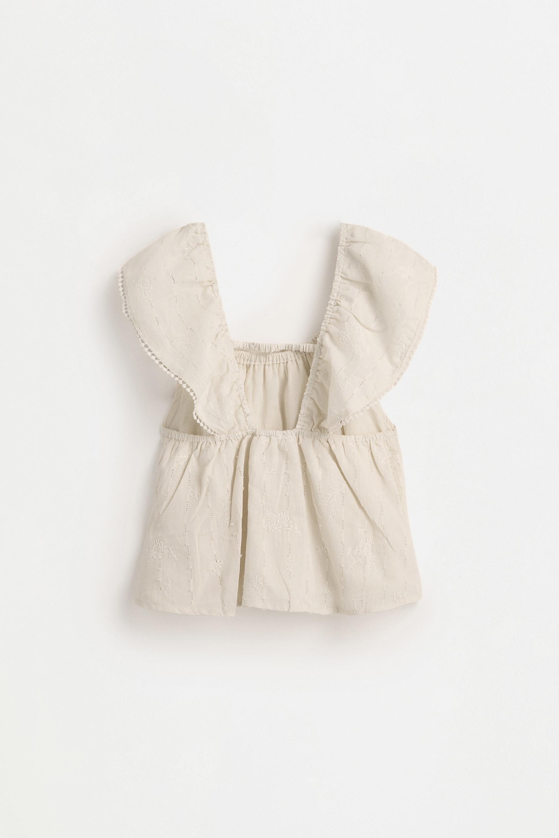 Embroidered blouse — SAND