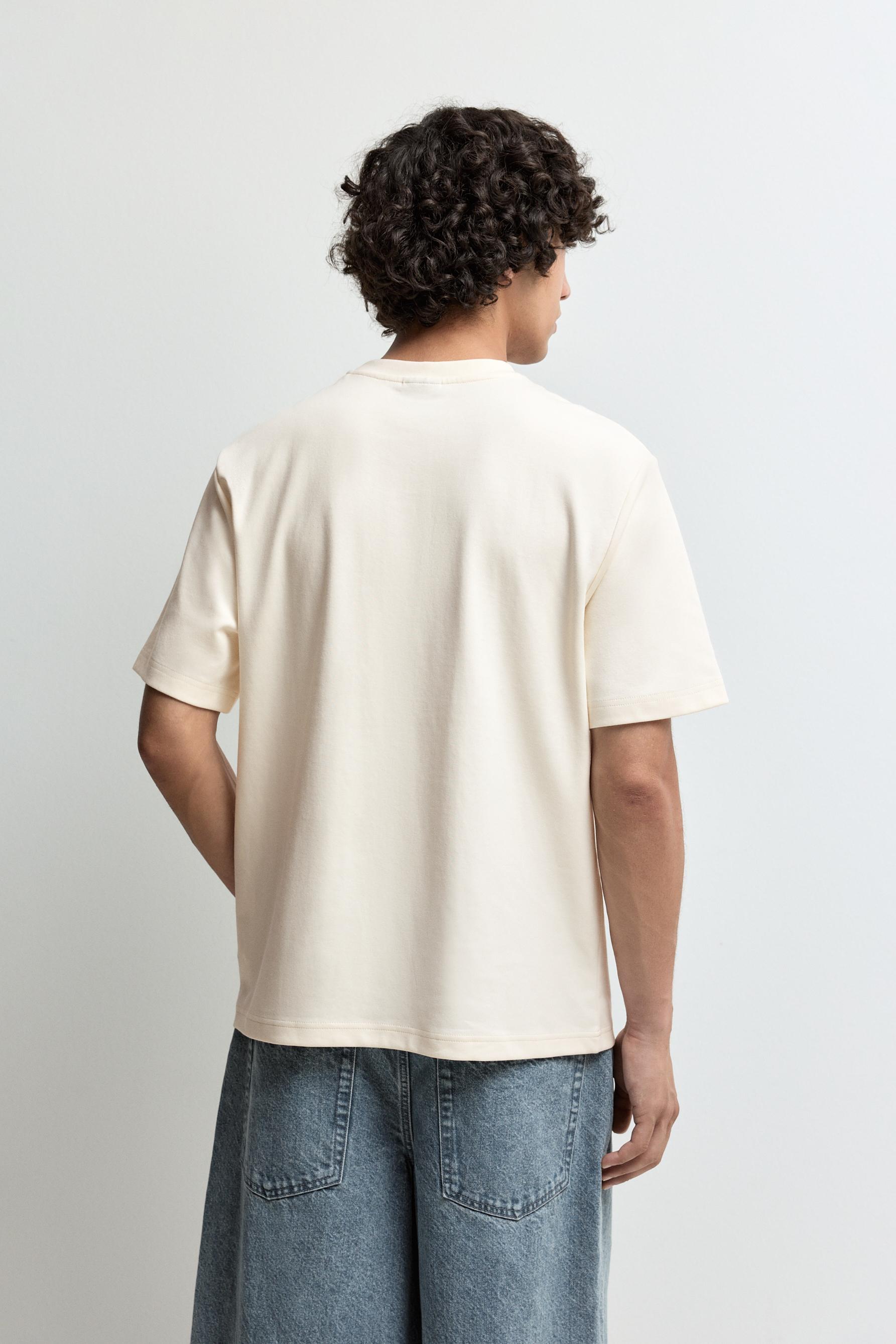 Embroidered interlock T-shirt — BUTTER