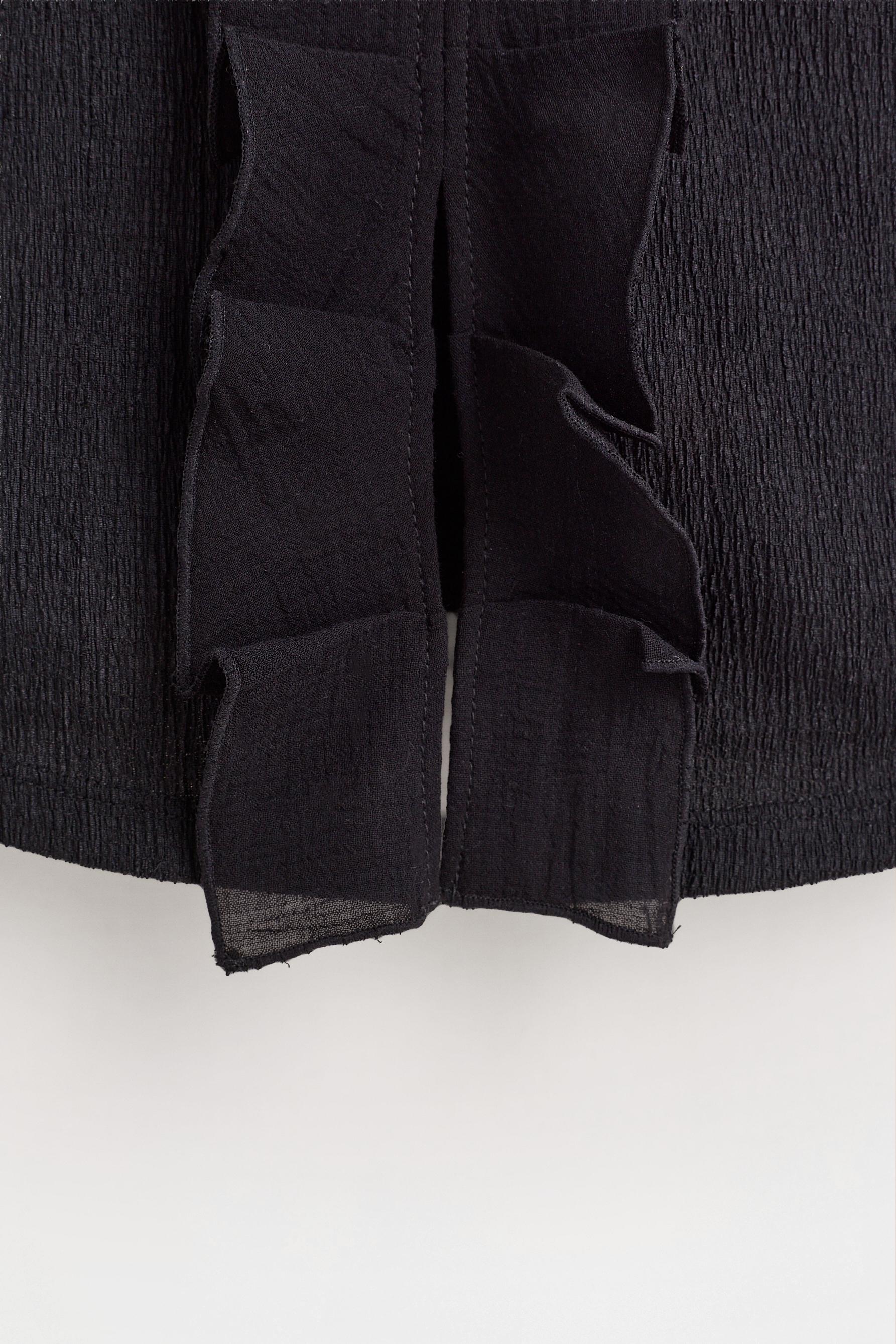 Ruffled top — BLACK