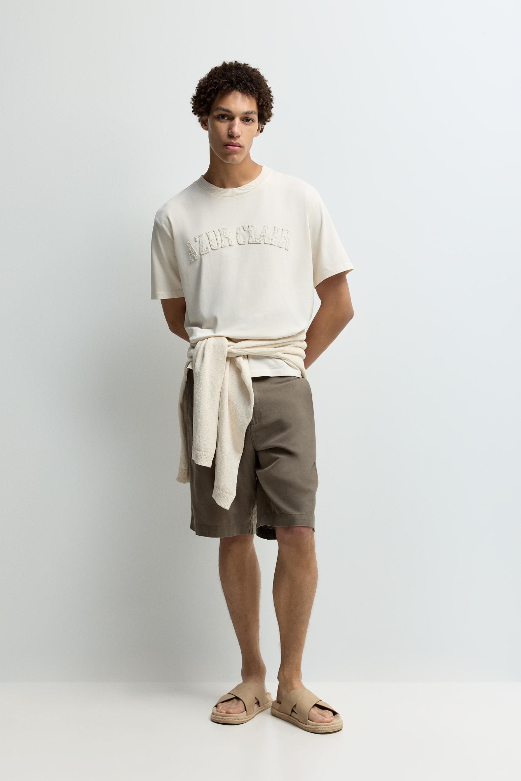 Slogan patch T-shirt — BUTTER