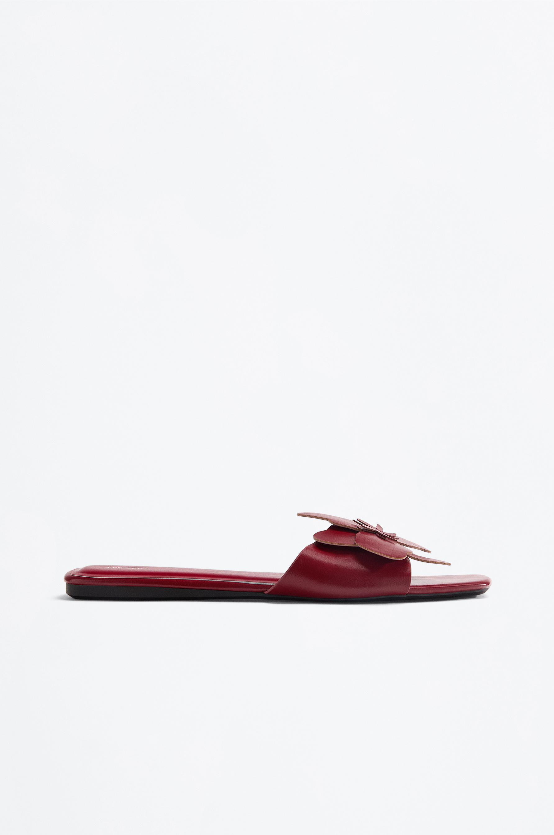 Flat slider sandals with flower detail — RED
