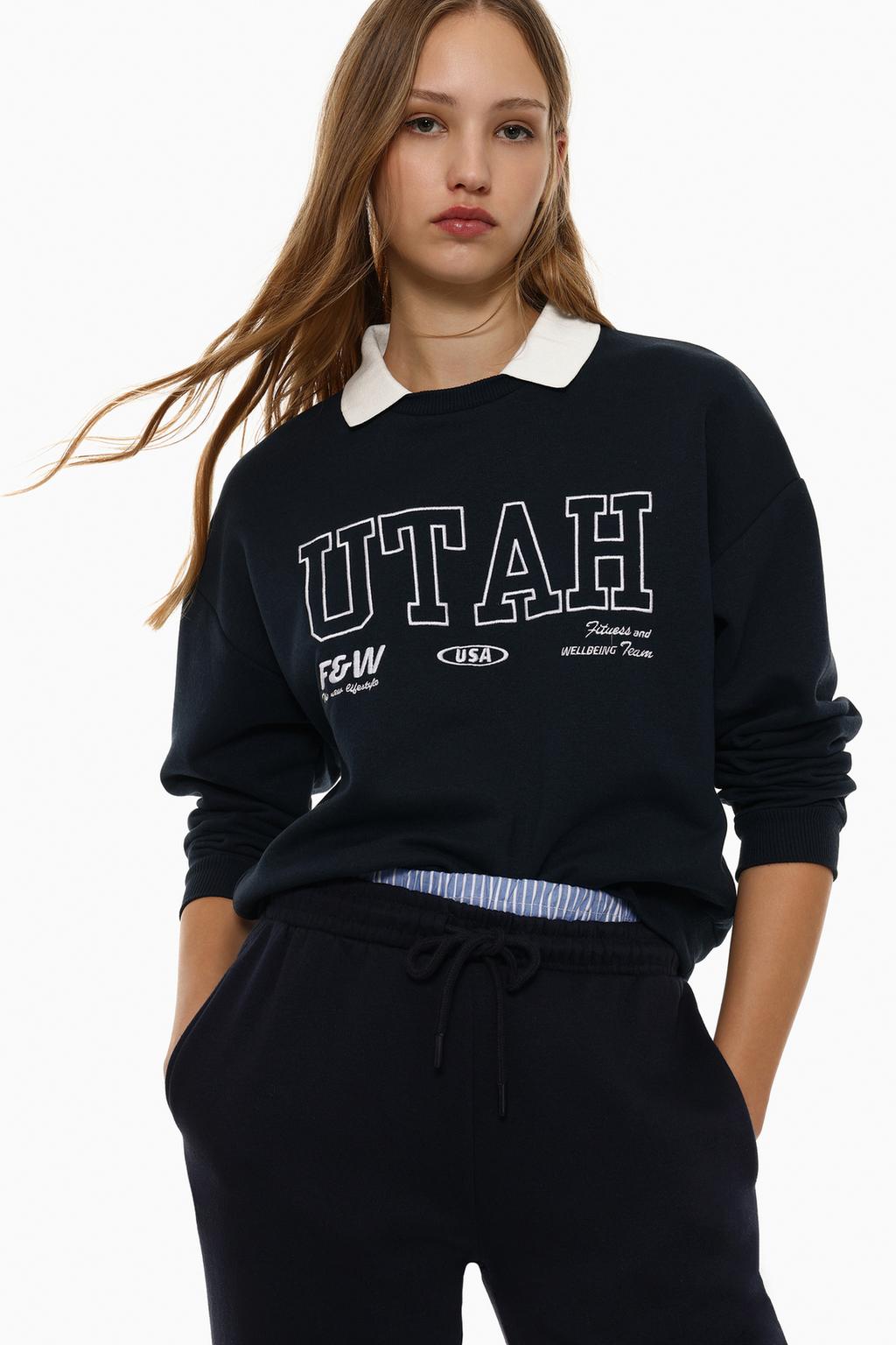 Embroidered sweatshirt with polo collar