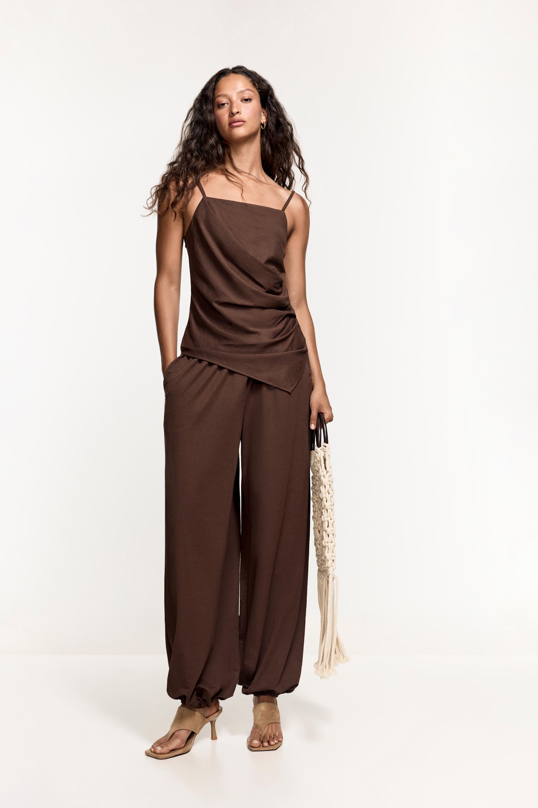 Flowing asymmetric top — CHOCOLATE