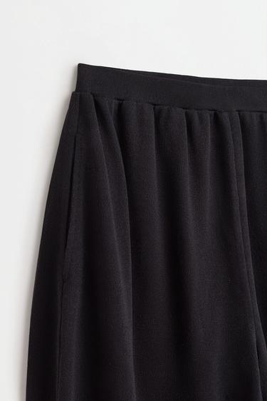Flowing carrot fit trousers — BLACK 7