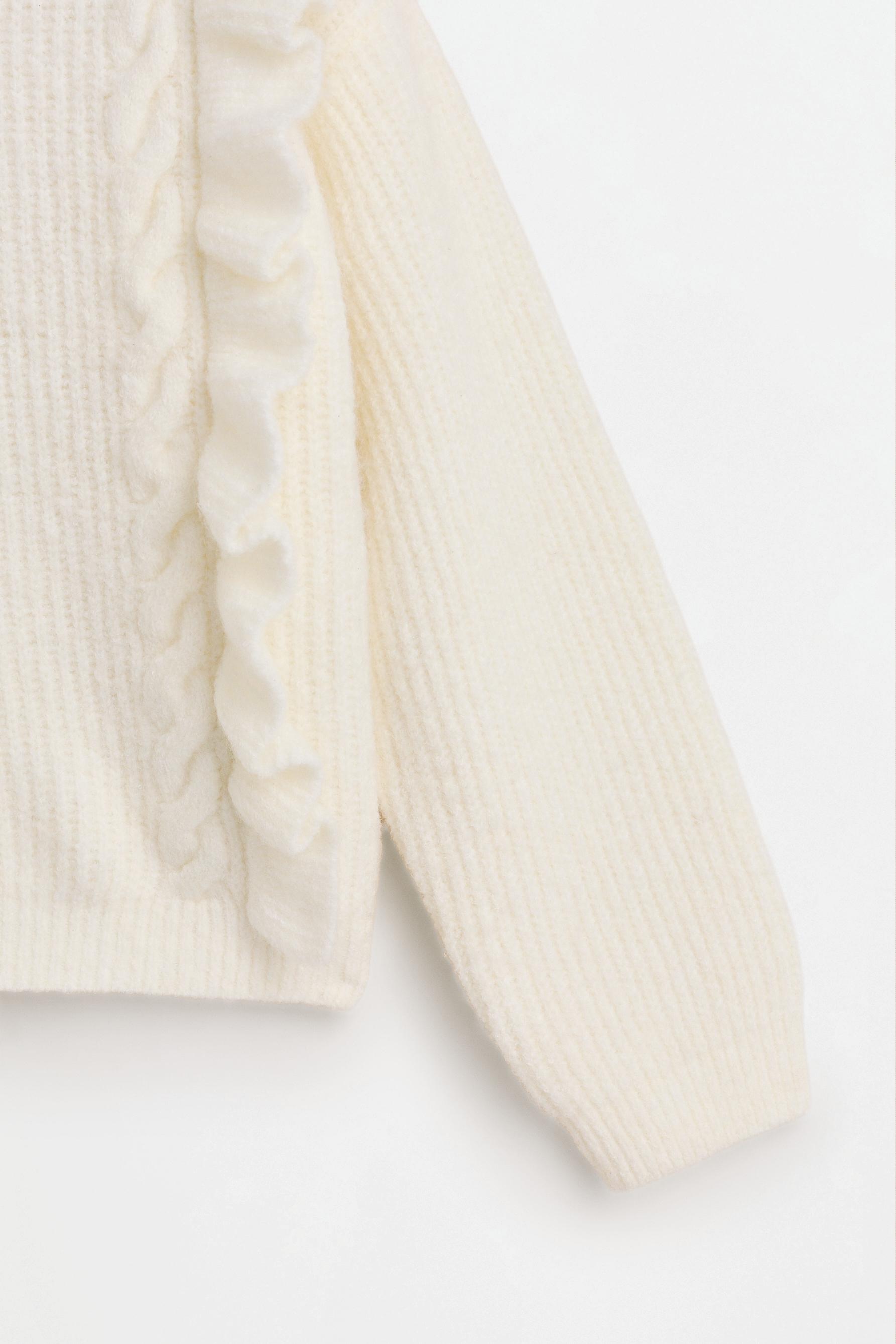 Ribbed ruffle sweater — OFF WHITE