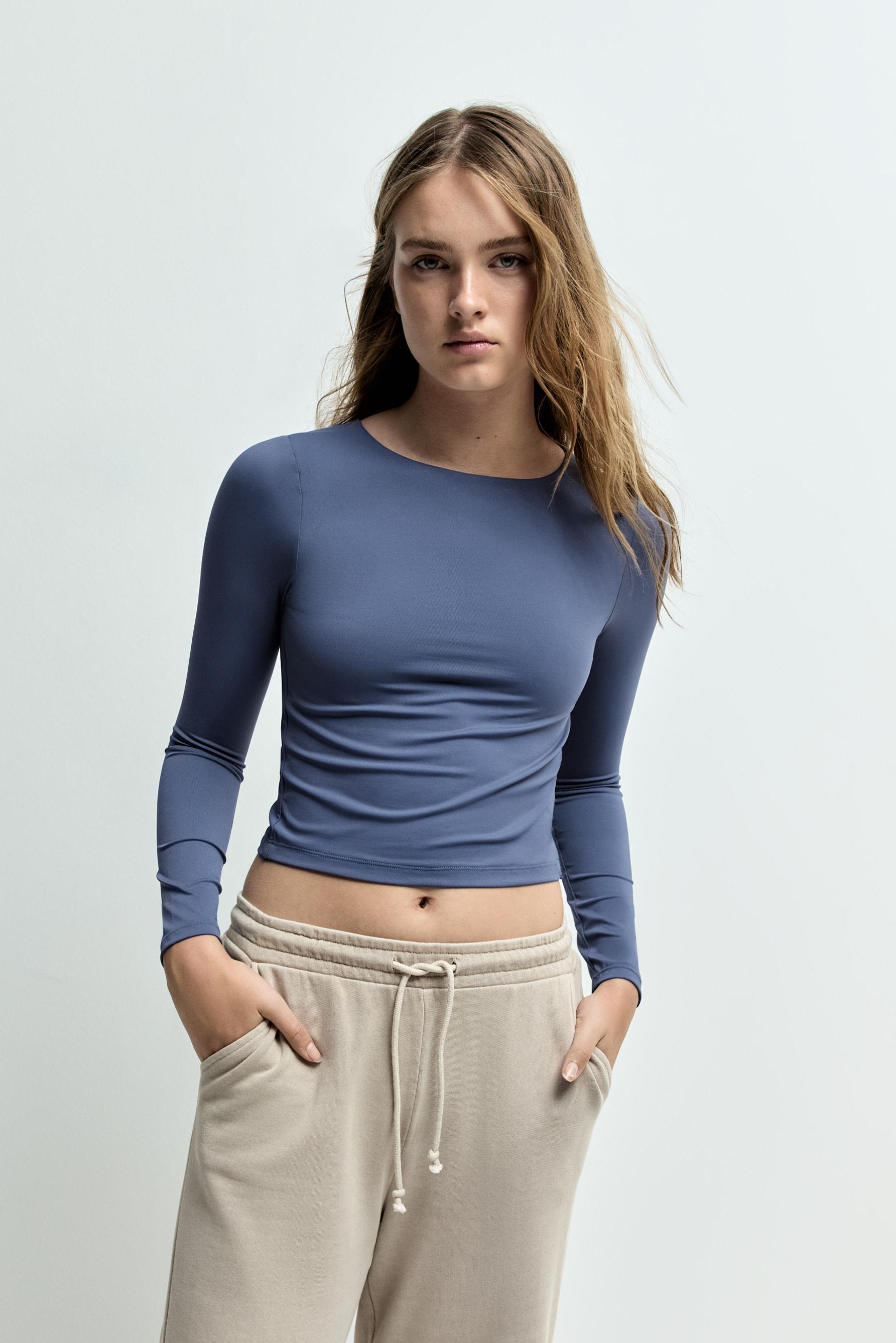 Top poliamida elástica espalda cut out