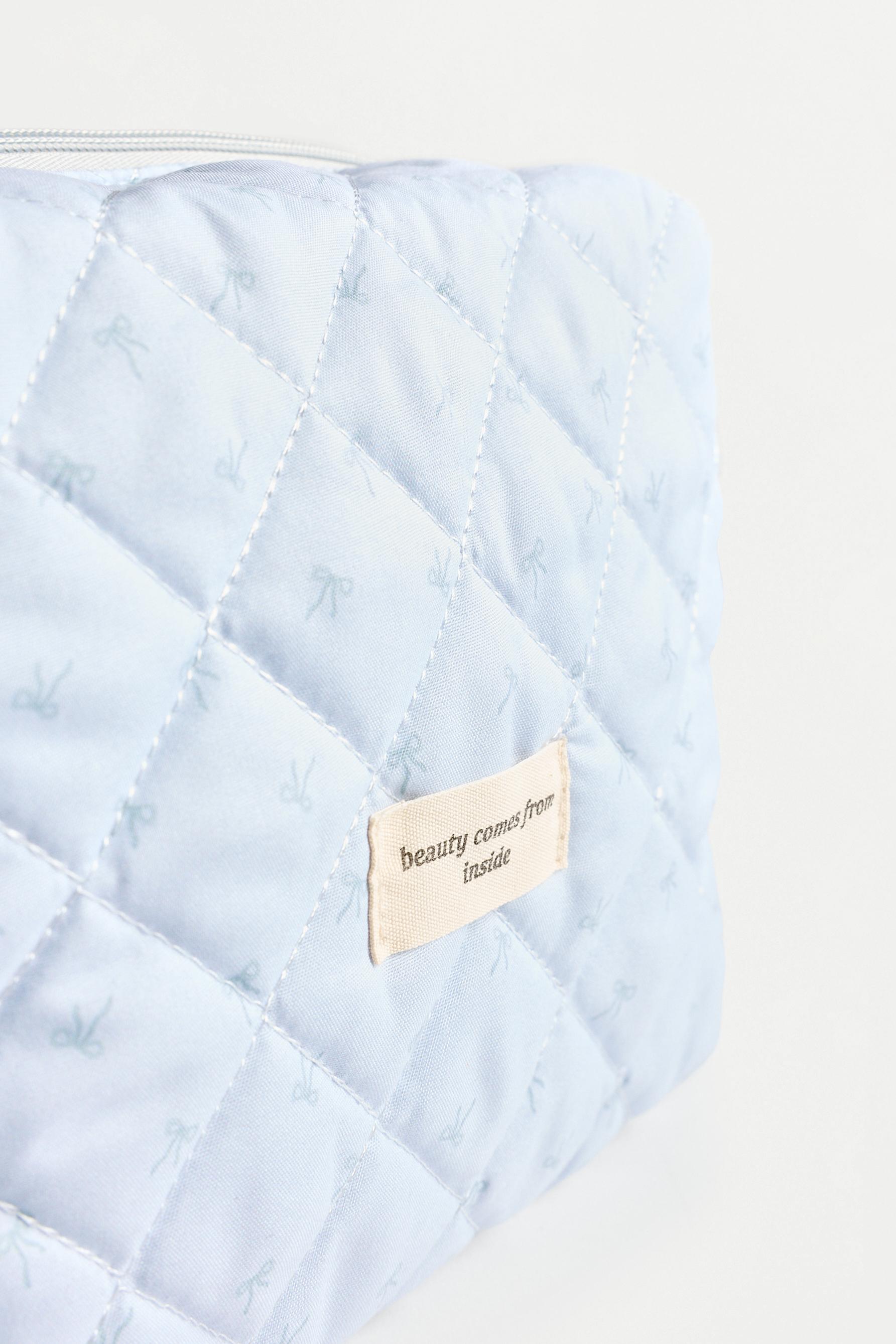 Large bow print toiletry bag — PASTEL BLUE