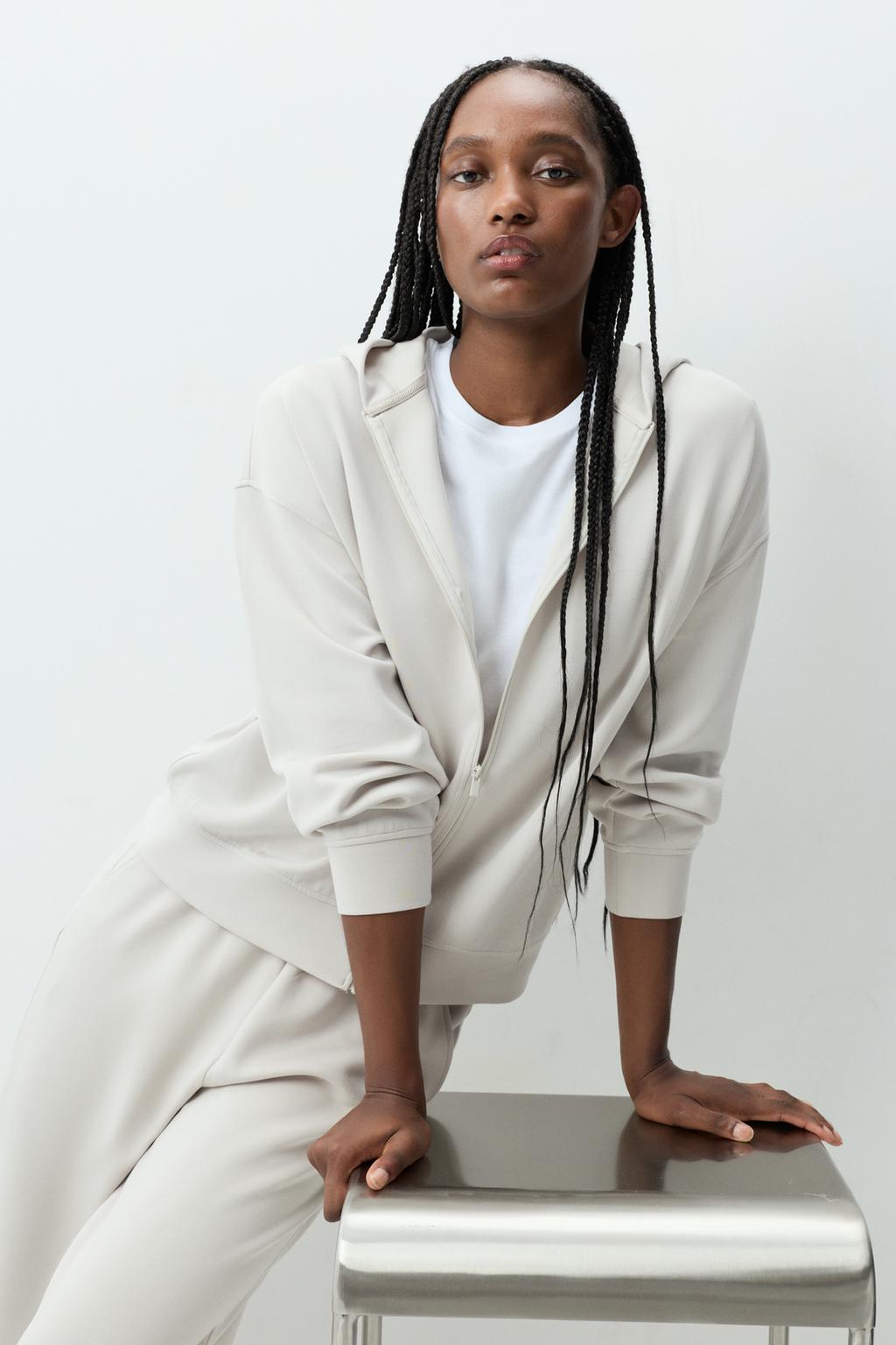 Dessuadora esportiva oversize