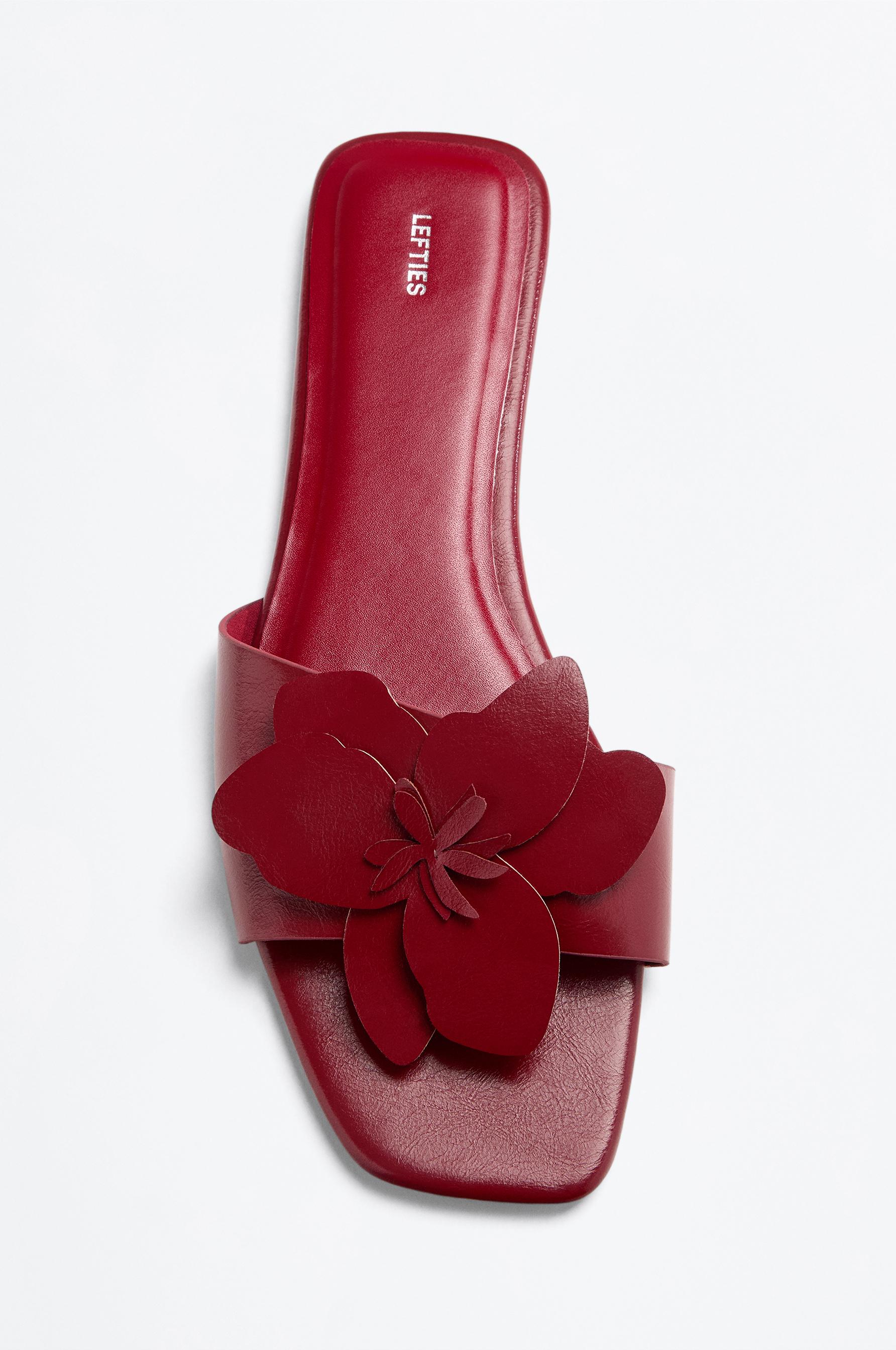Flat slider sandals with flower detail — RED
