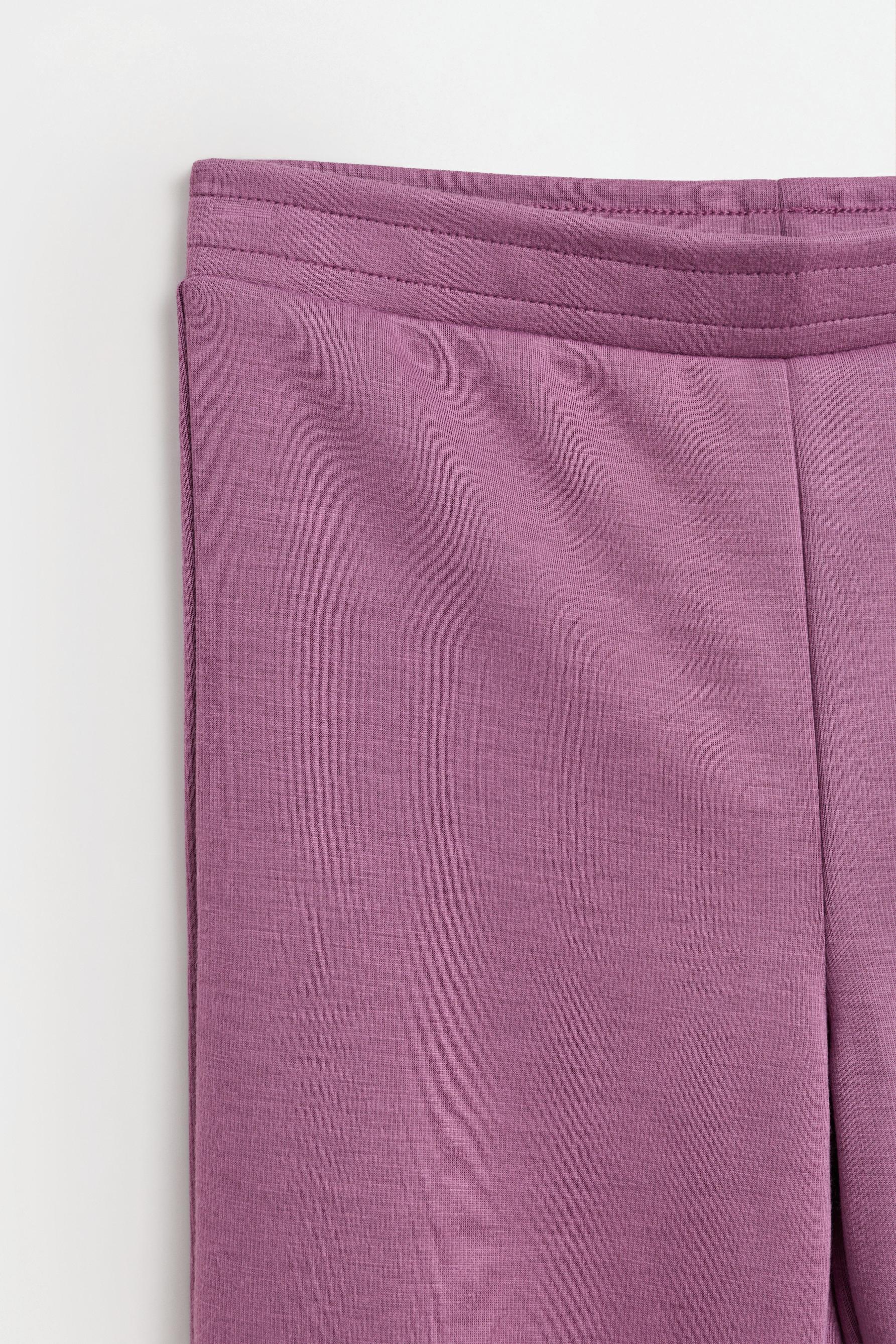 Bell bottom trousers with splits — REDDISH