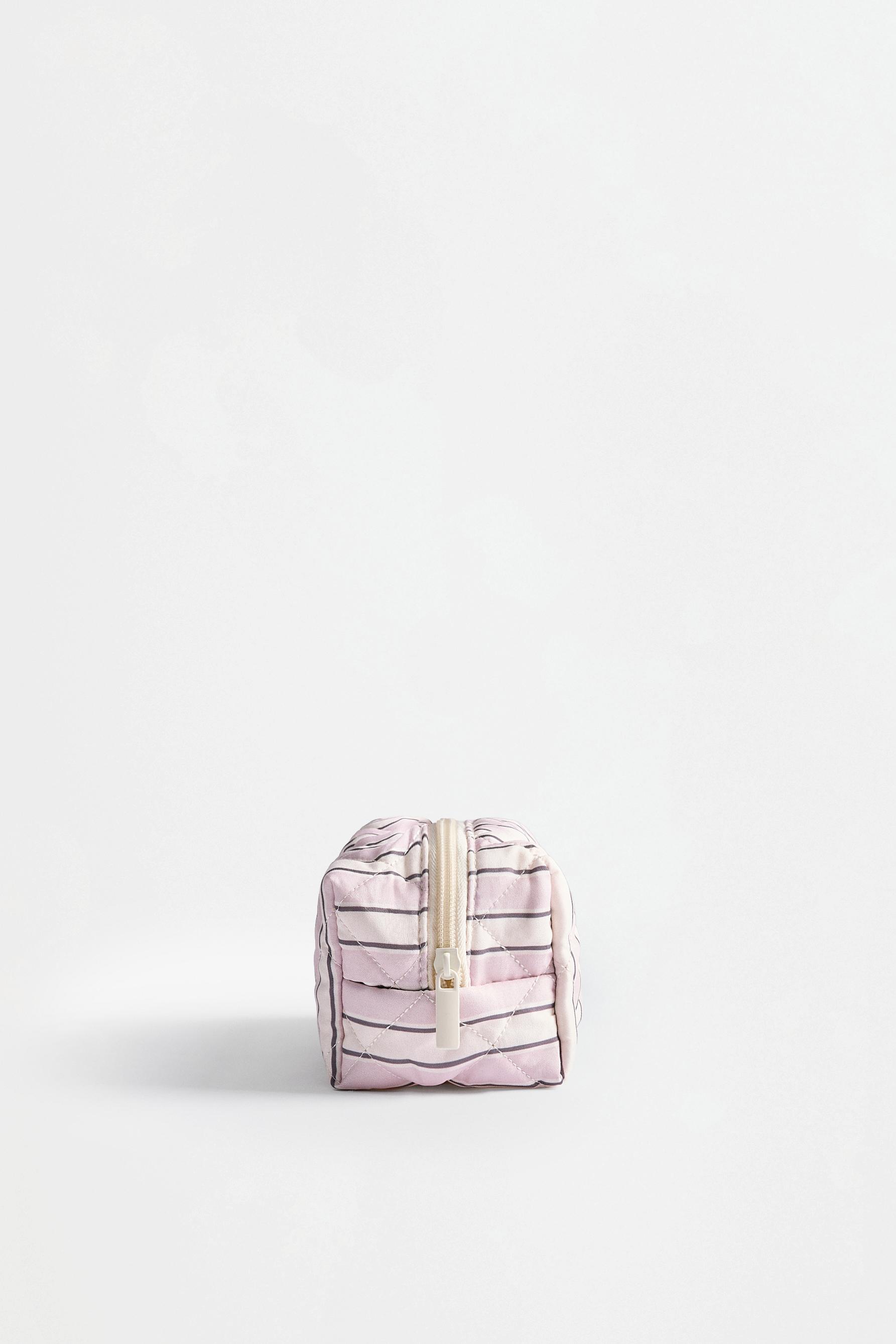 Quilted Snoopy Peanuts™ toiletry bag — BEIGE