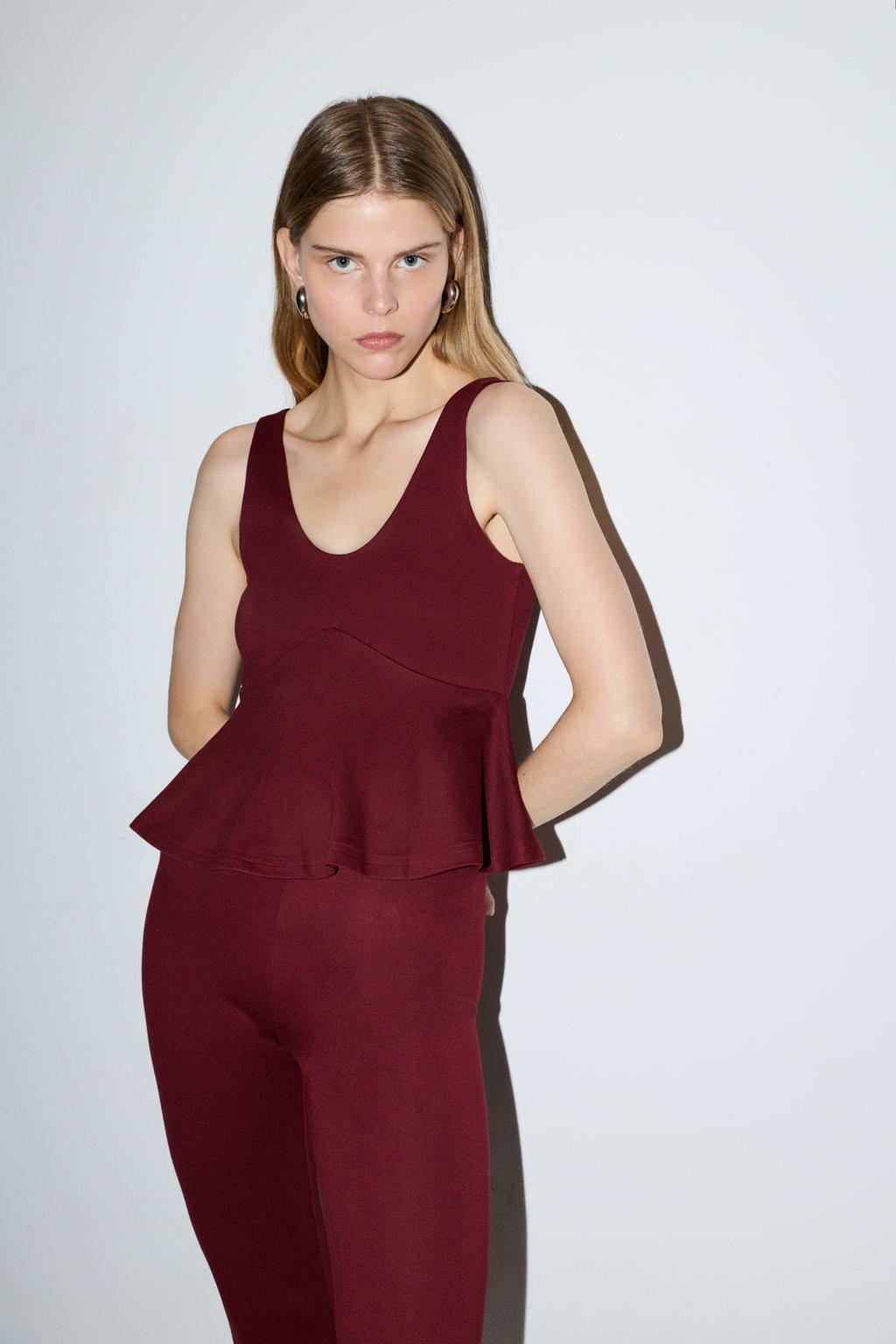 Top peplum punto roma