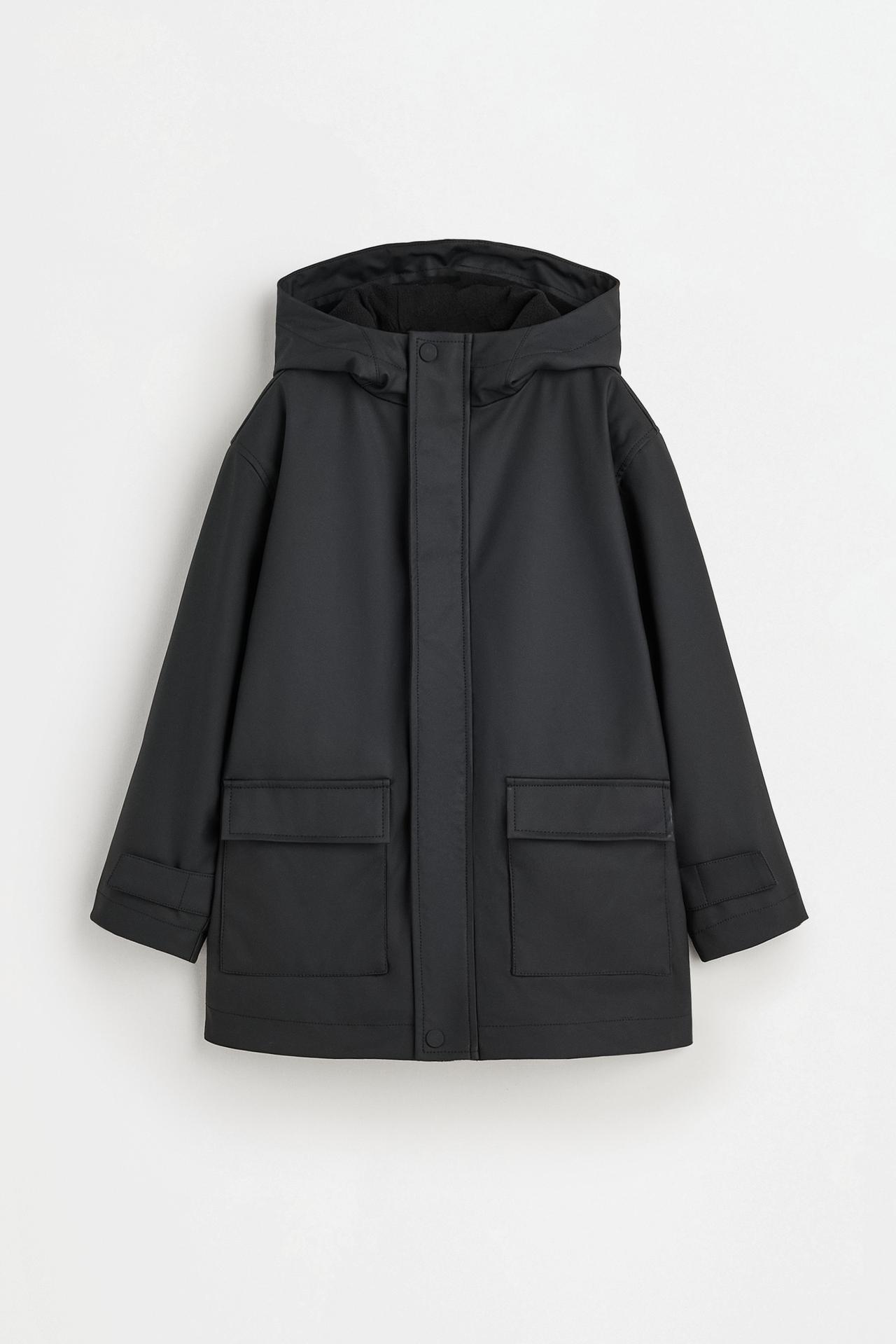 Long rubberised parka — BLACK