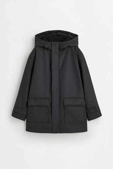 Long rubberised parka — BLACK 1