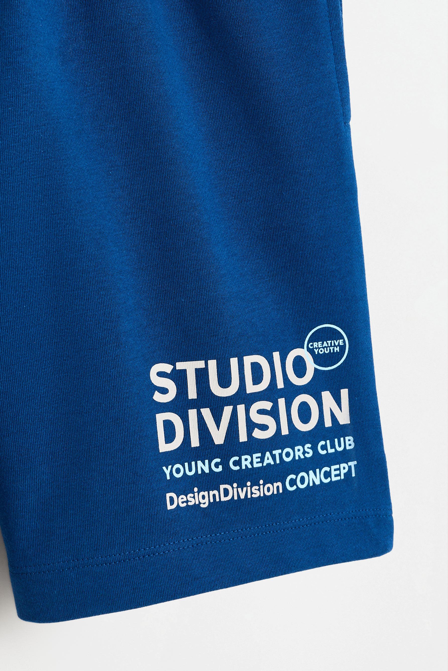 Plush Bermuda shorts with text — DARK BLUE