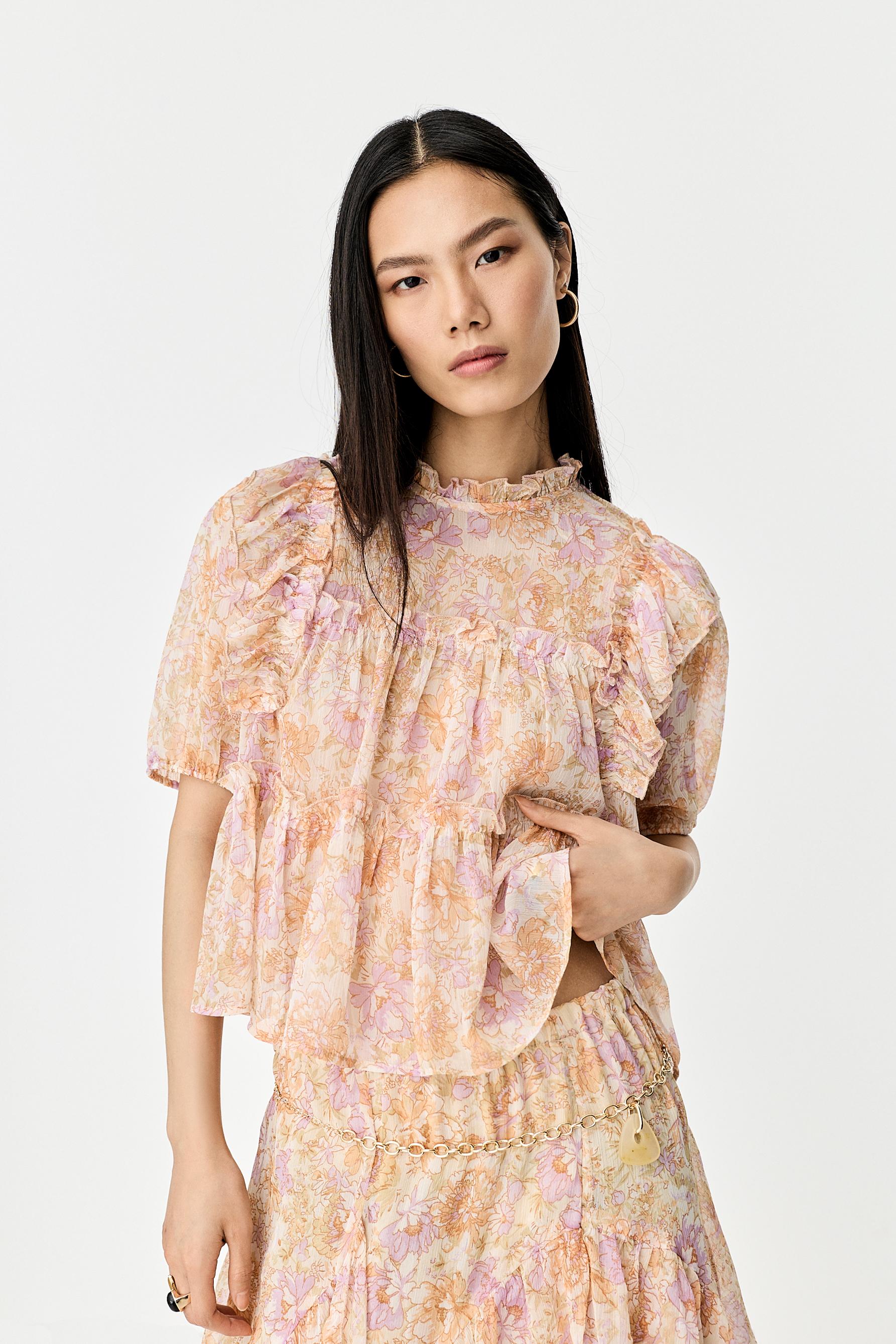 Blusa estampada volantes