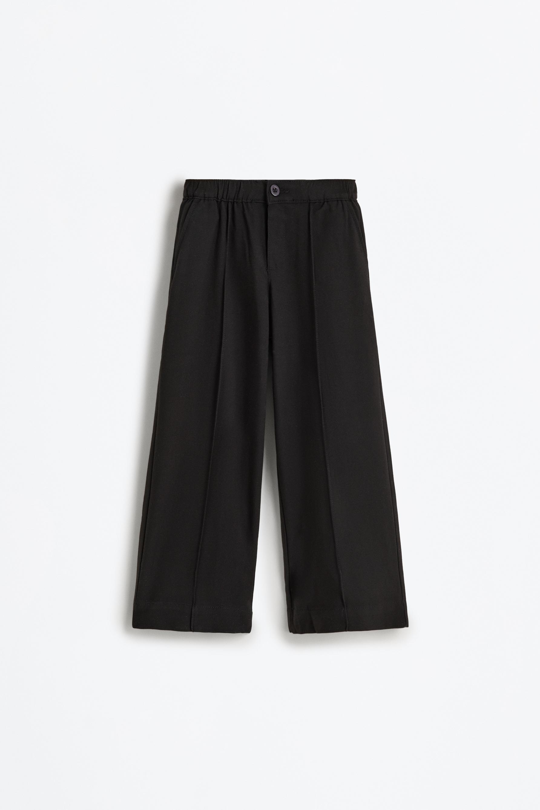 Pleated trousers — BLACK
