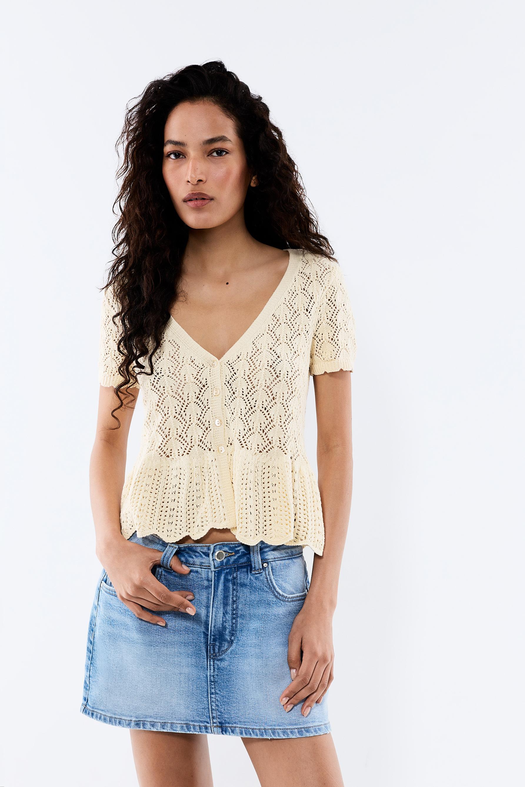 Top punto calado peplum