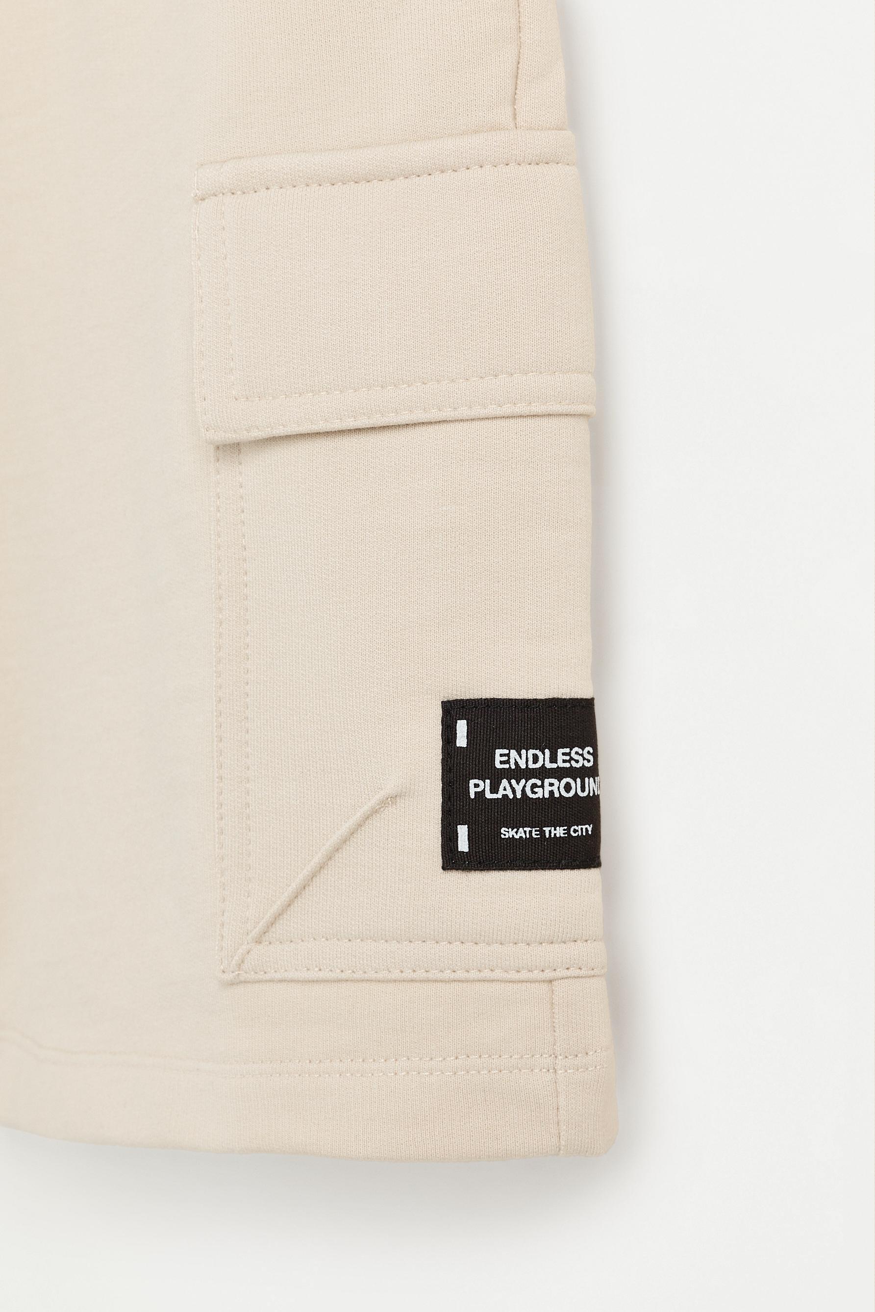 Plush cargo Bermuda shorts — PALE SAND