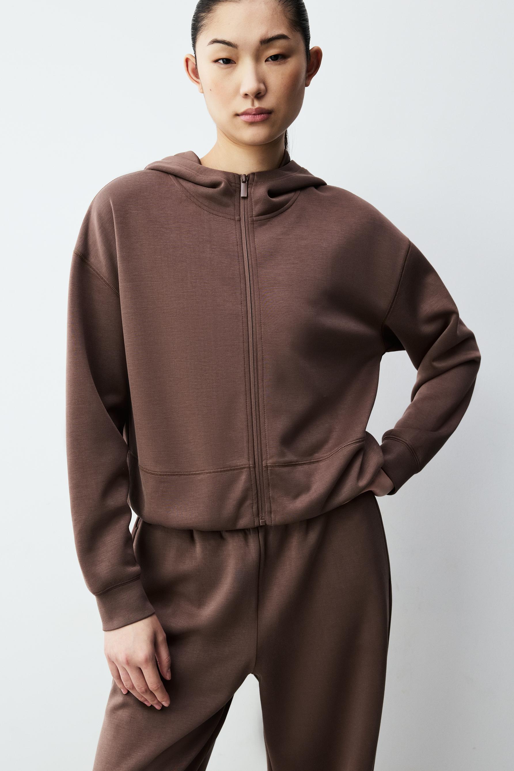 Sudadera cremallera cuello capucha