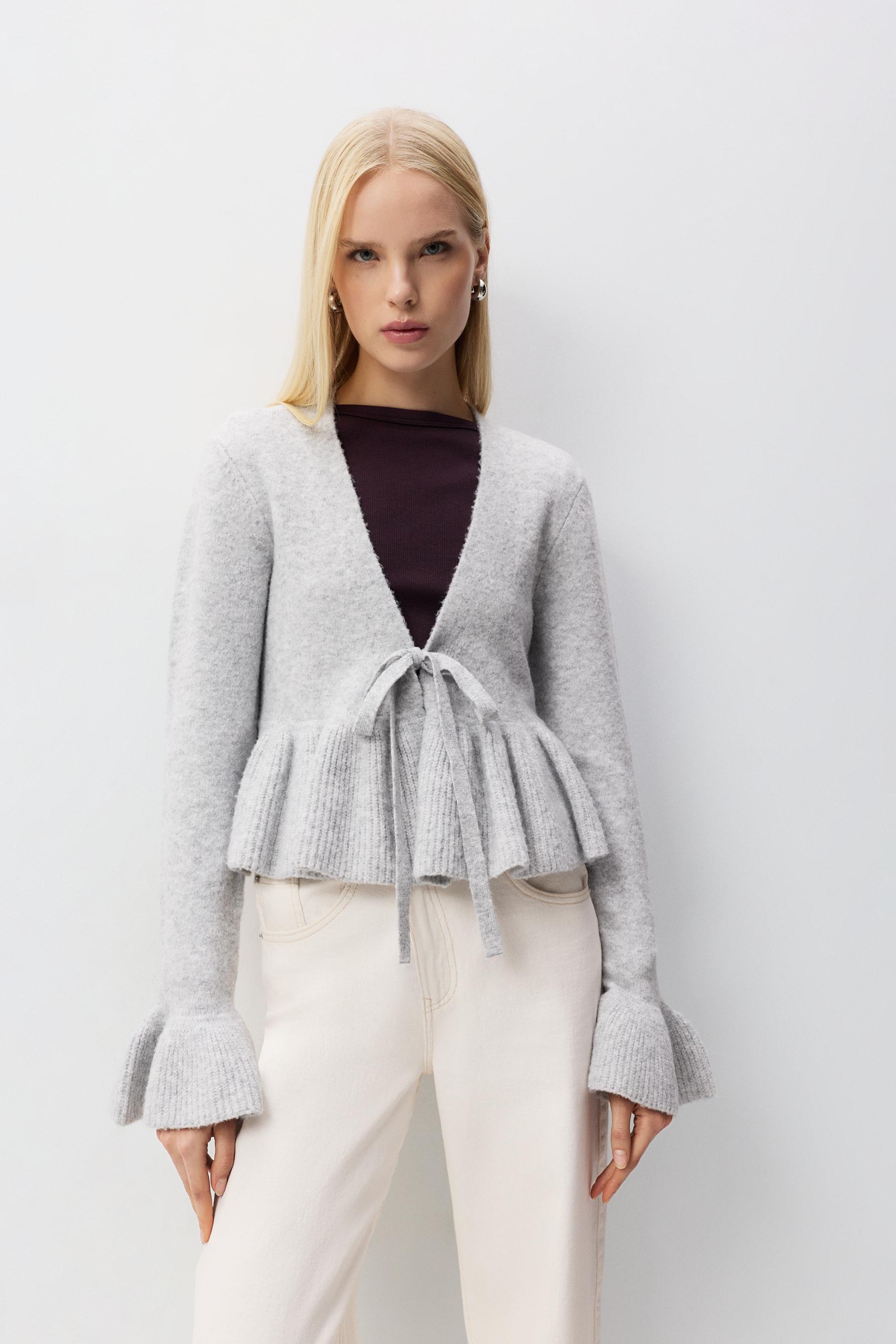 Chaqueta peplum punto