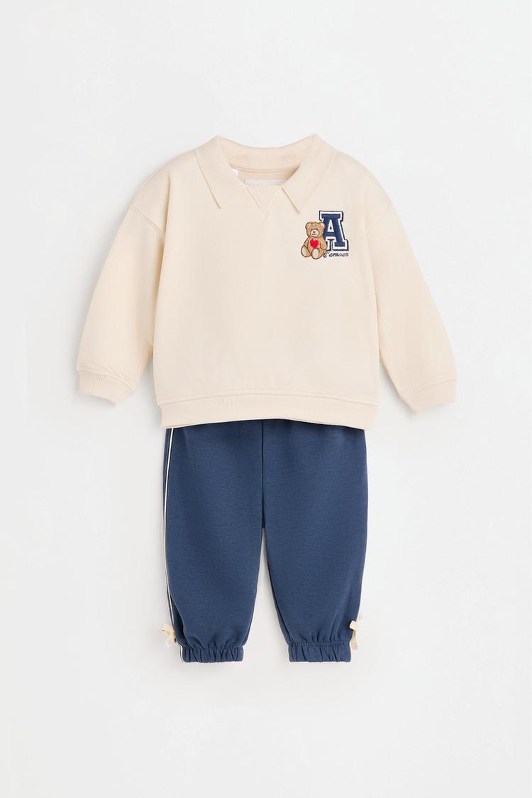 Polo sweatshirt and bow trousers set — ECRU