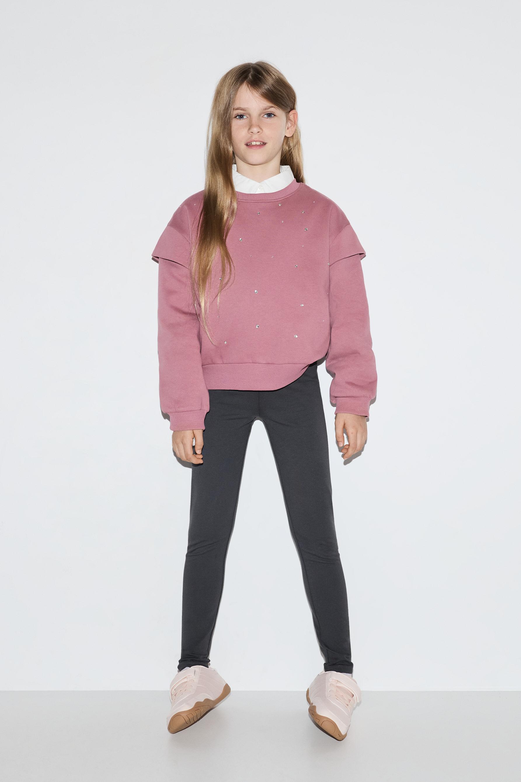 Sudadera apliques brillantes